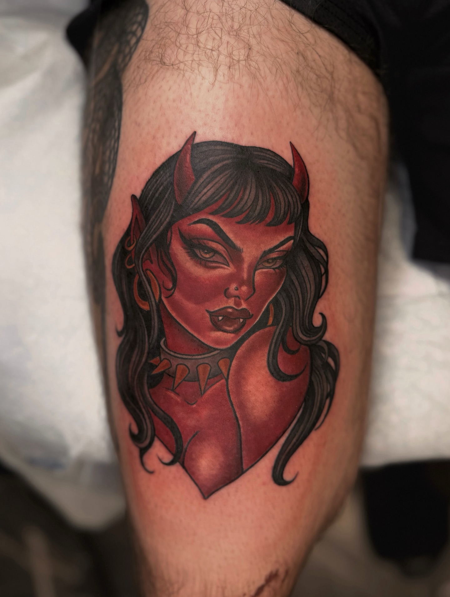 Devil woman American traditional tattoo on the thigh by Suda