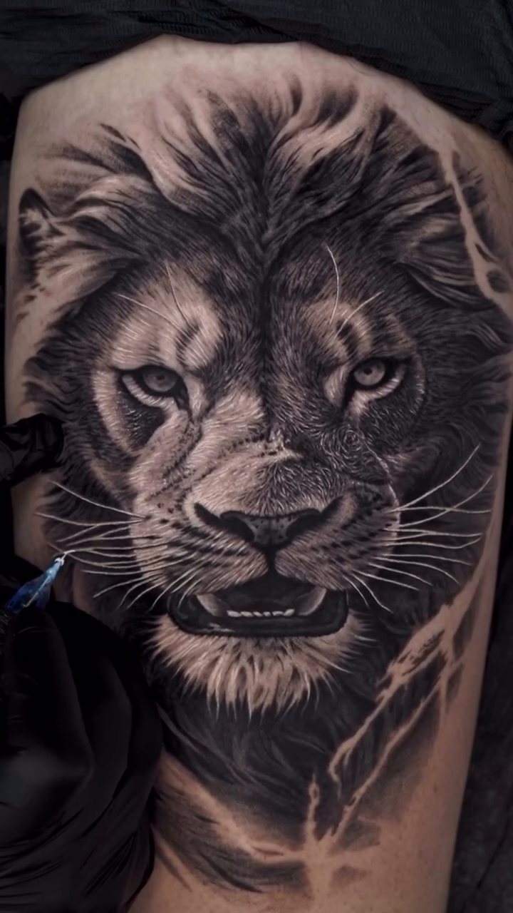 Lion portrait realism tattoo by Jesus Alonso