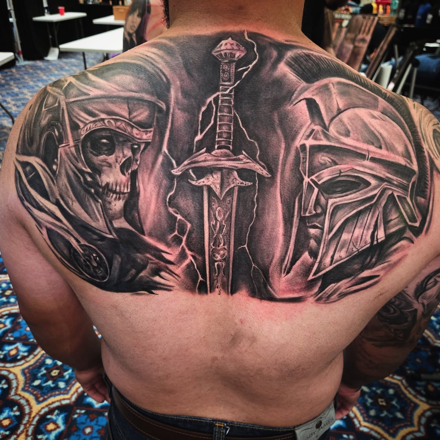 Tattoo by @goth_ross_502 — black_and_grey, realism