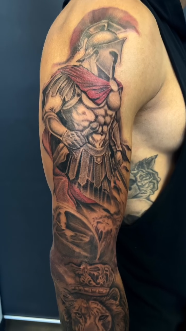 Spartan warrior and lion realism tattoo by Cultura