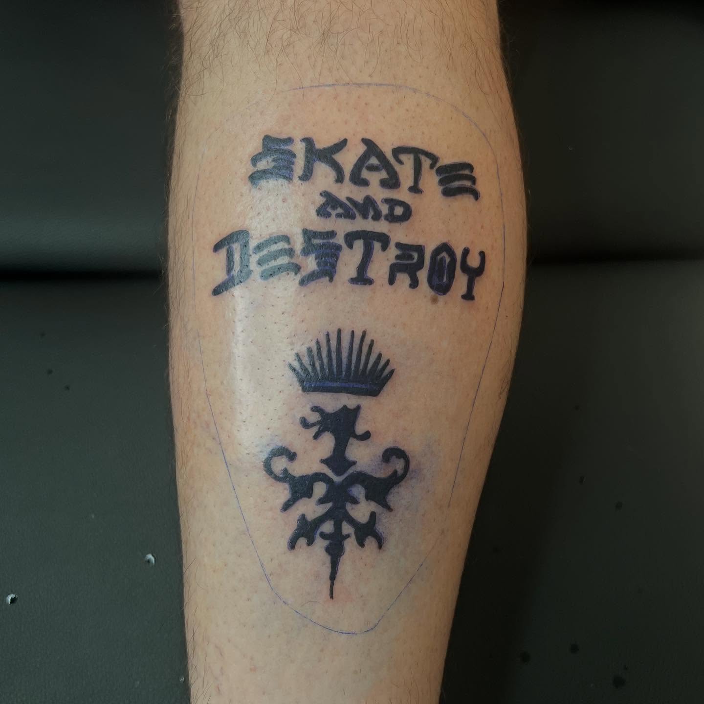 Skate and destroy lettering script tattoo on the forearm by Davidsteeletattoos, Dallas, Texas