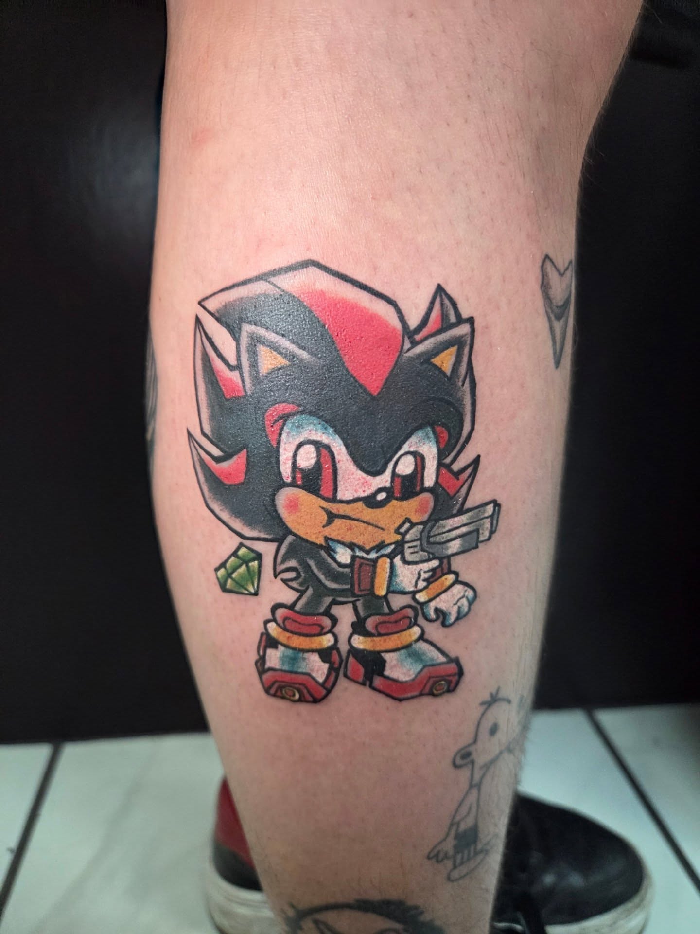 Shadow the Hedgehog anime tattoo on the forearm by Chaz Escobar