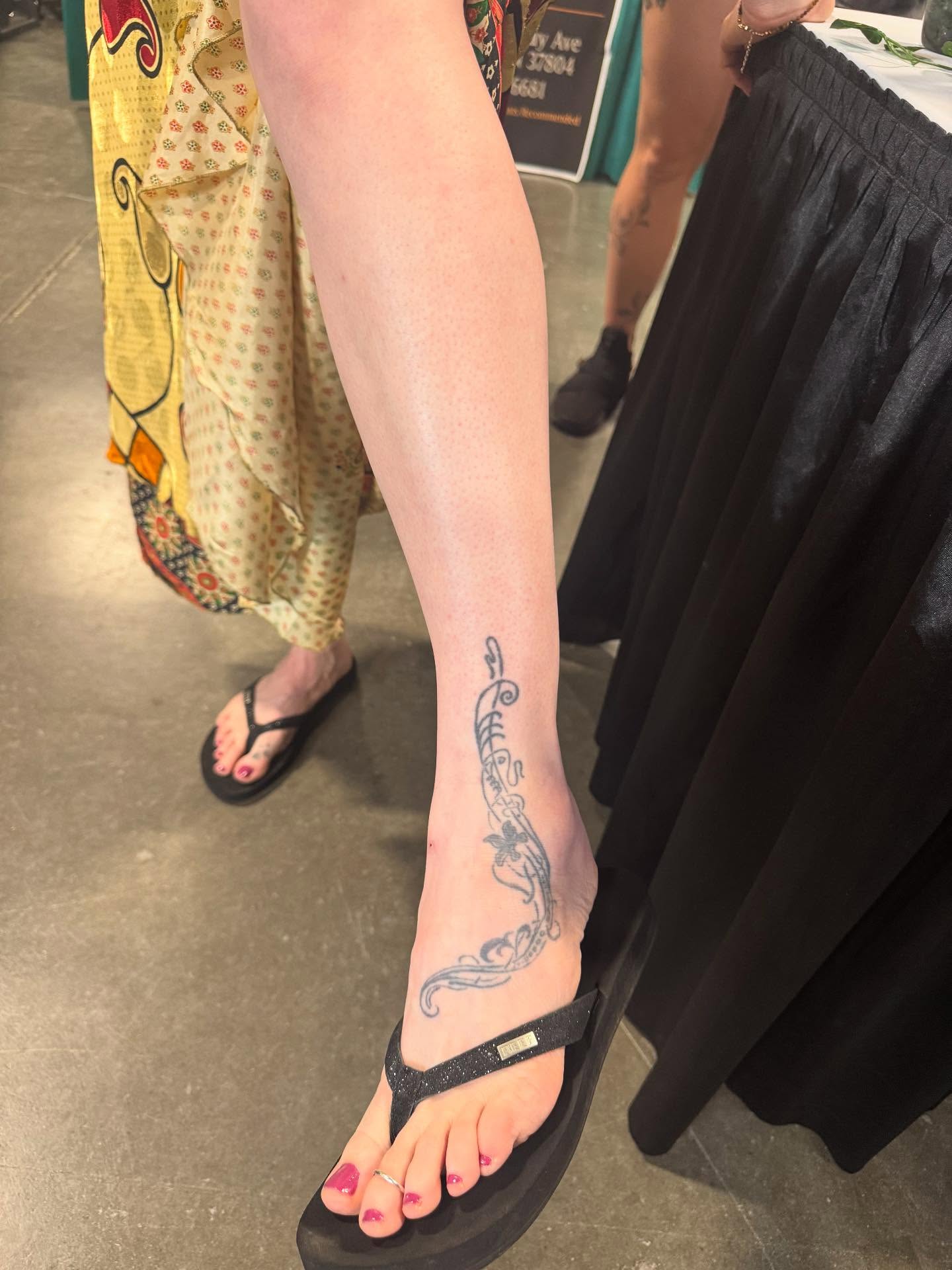 Floral vine black and grey tattoo on the leg by Nicholas A. Estes-Davis