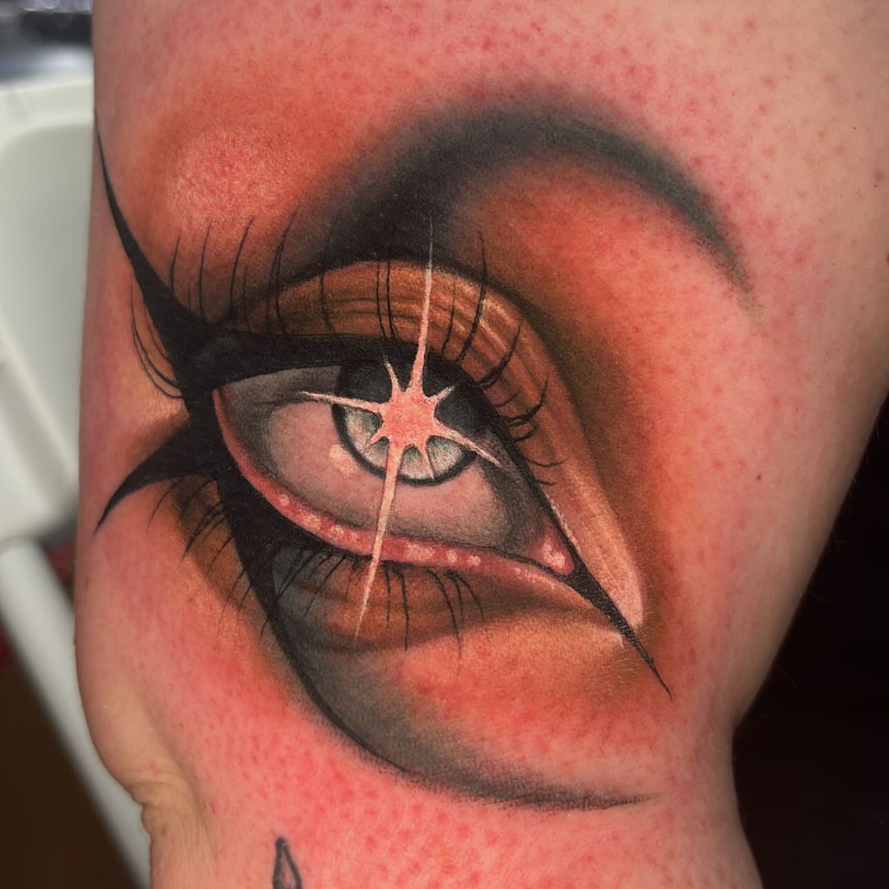 Eye realism tattoo on the forearm by Holli Marie