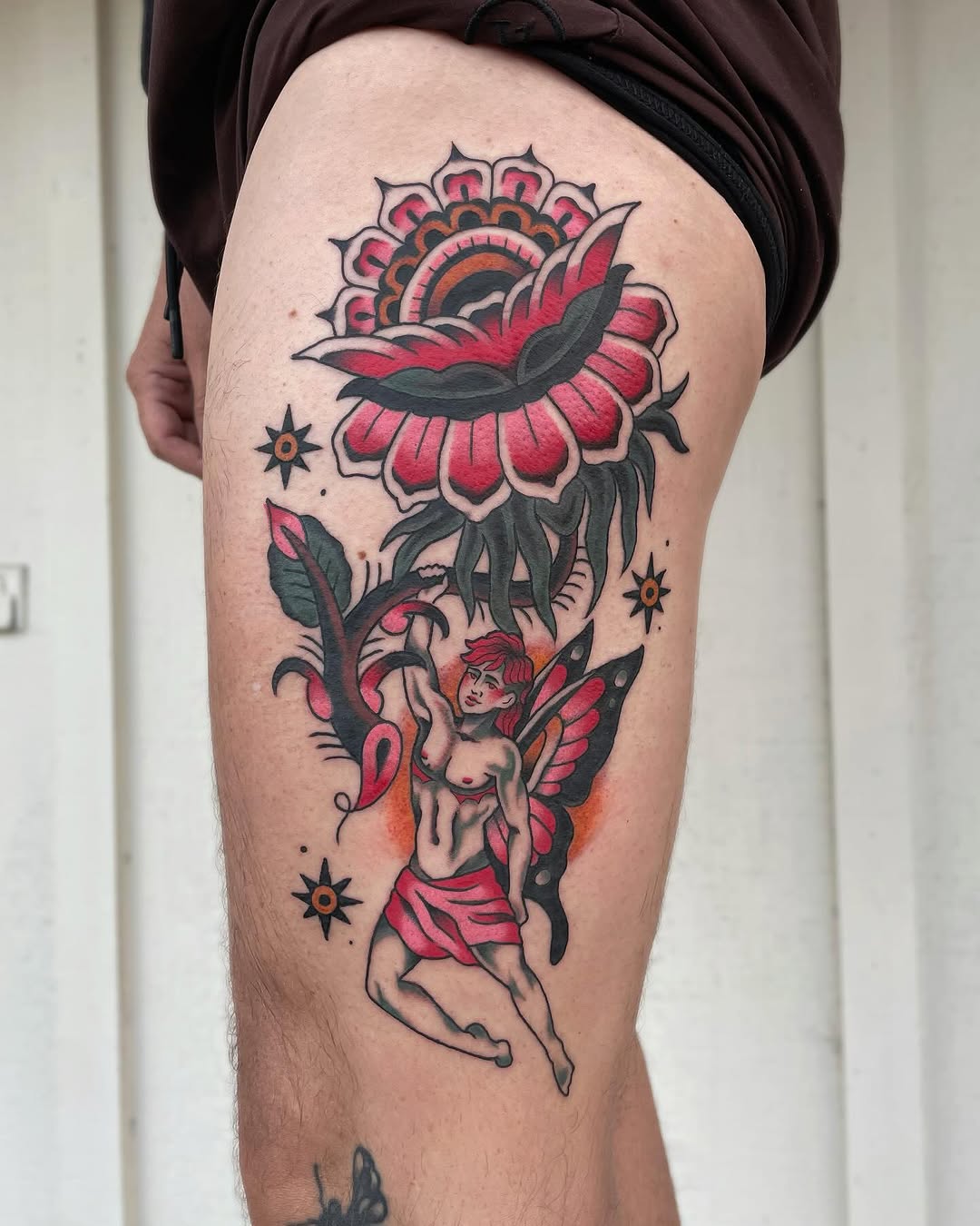 Fairy and flower neo-traditional tattoo on the thigh by Shawn Paradis, Seattle, Washington