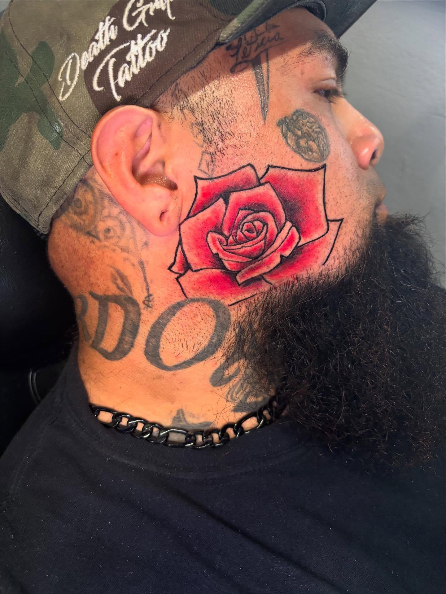 Red rose realism tattoo by Dre Ortiz