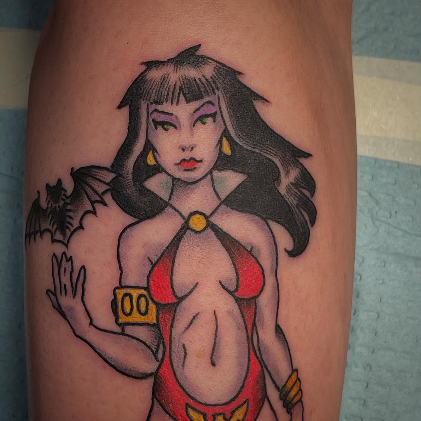 Woman in bikini American traditional tattoo on the thigh by Ian Bederman, Austin, Texas