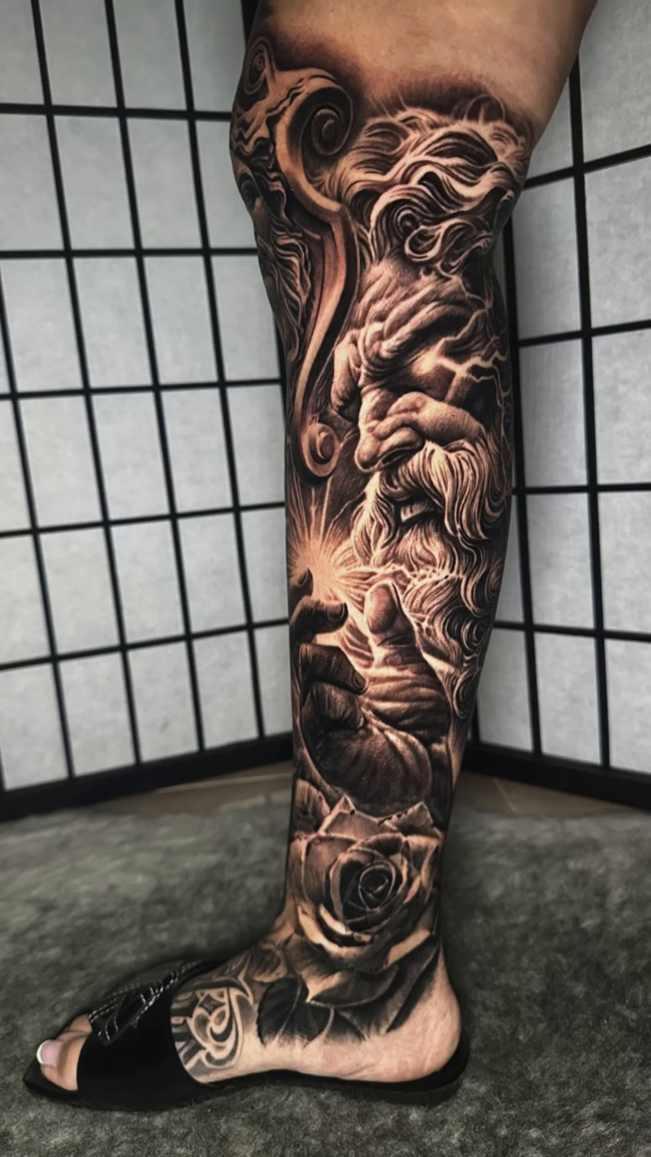 Religious imagery and portrait realism tattoo by Anthony Ramirez