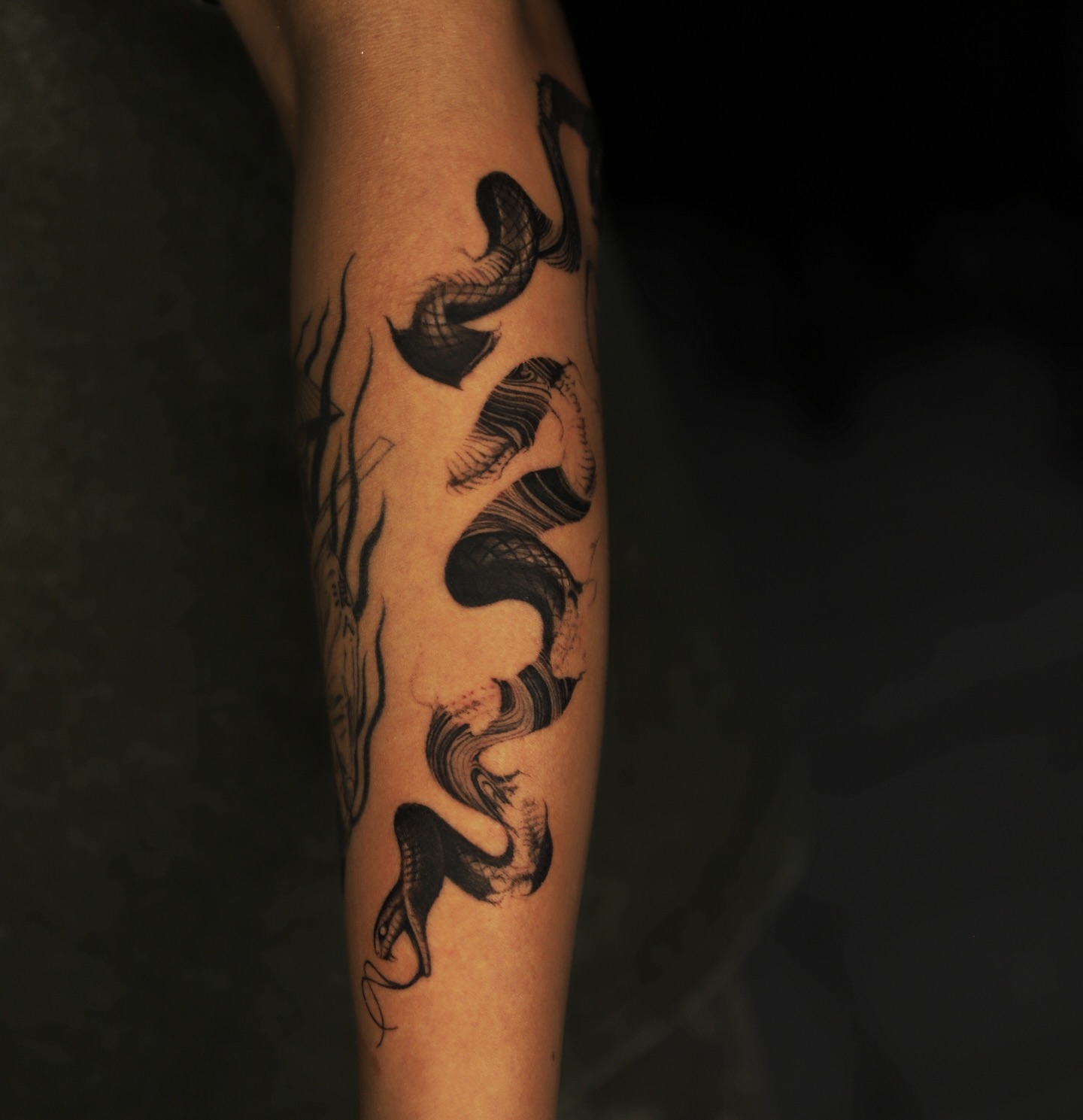 Abstract waves geometric tattoo on the forearm by Las Vegas tattoo