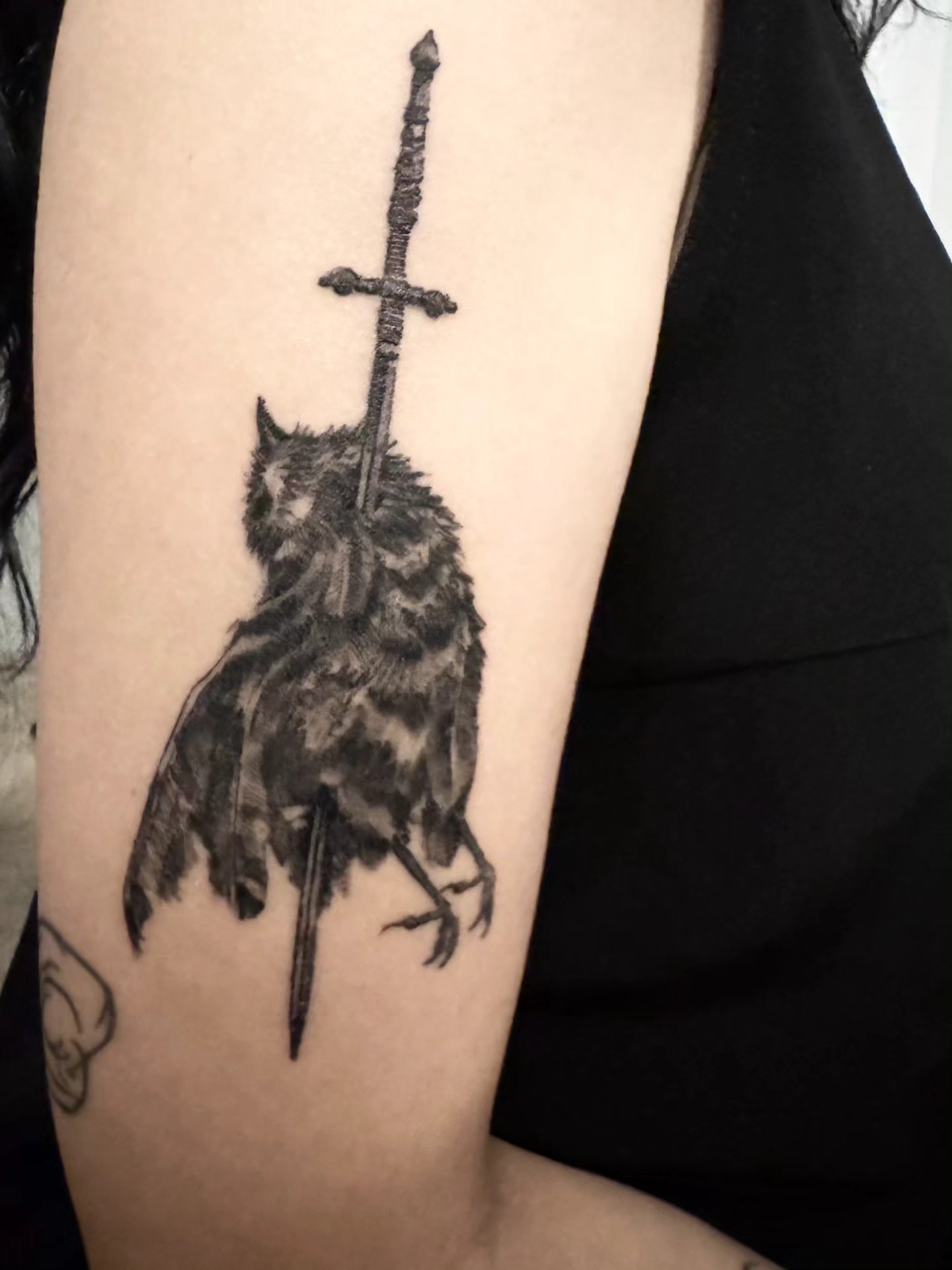 Owl and sword realism tattoo on the forearm by Pod Viñes