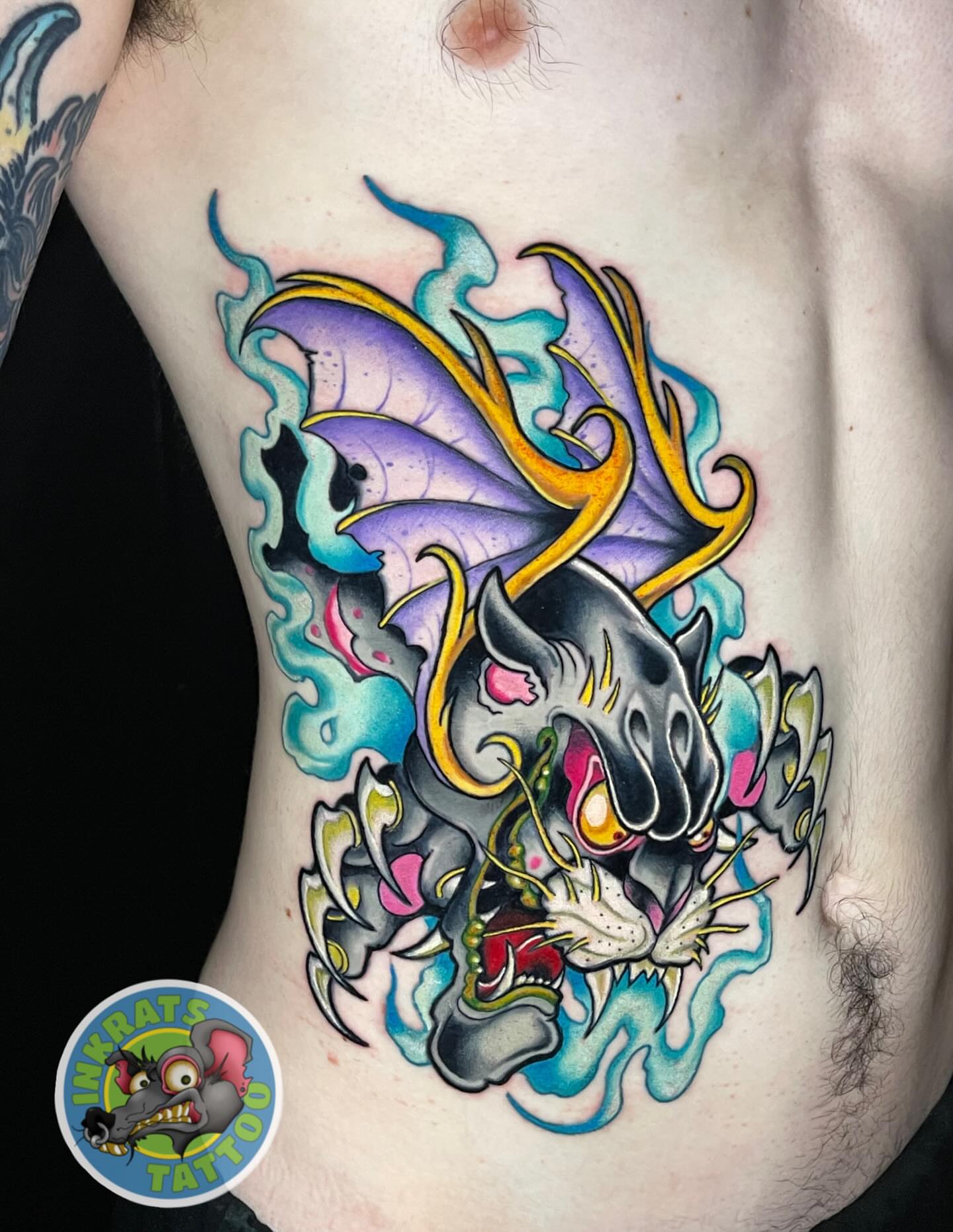 Panther American traditional tattoo on the ribs by Chadrick Gregory
