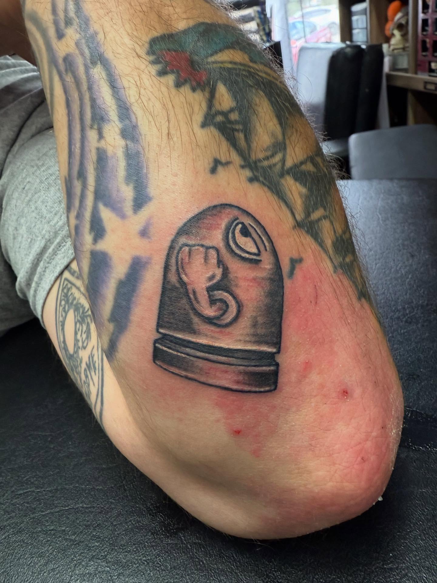 Baby in womb black and grey tattoo on the leg by @lady_raven_tattoo