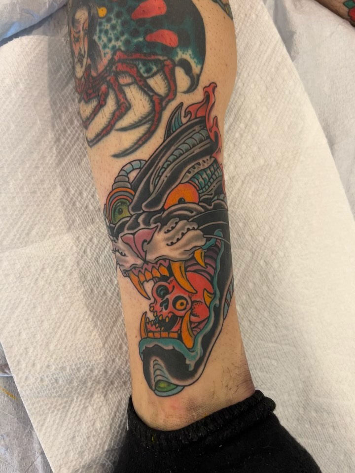 Demon skull American traditional tattoo on the forearm by Craig Gardyan