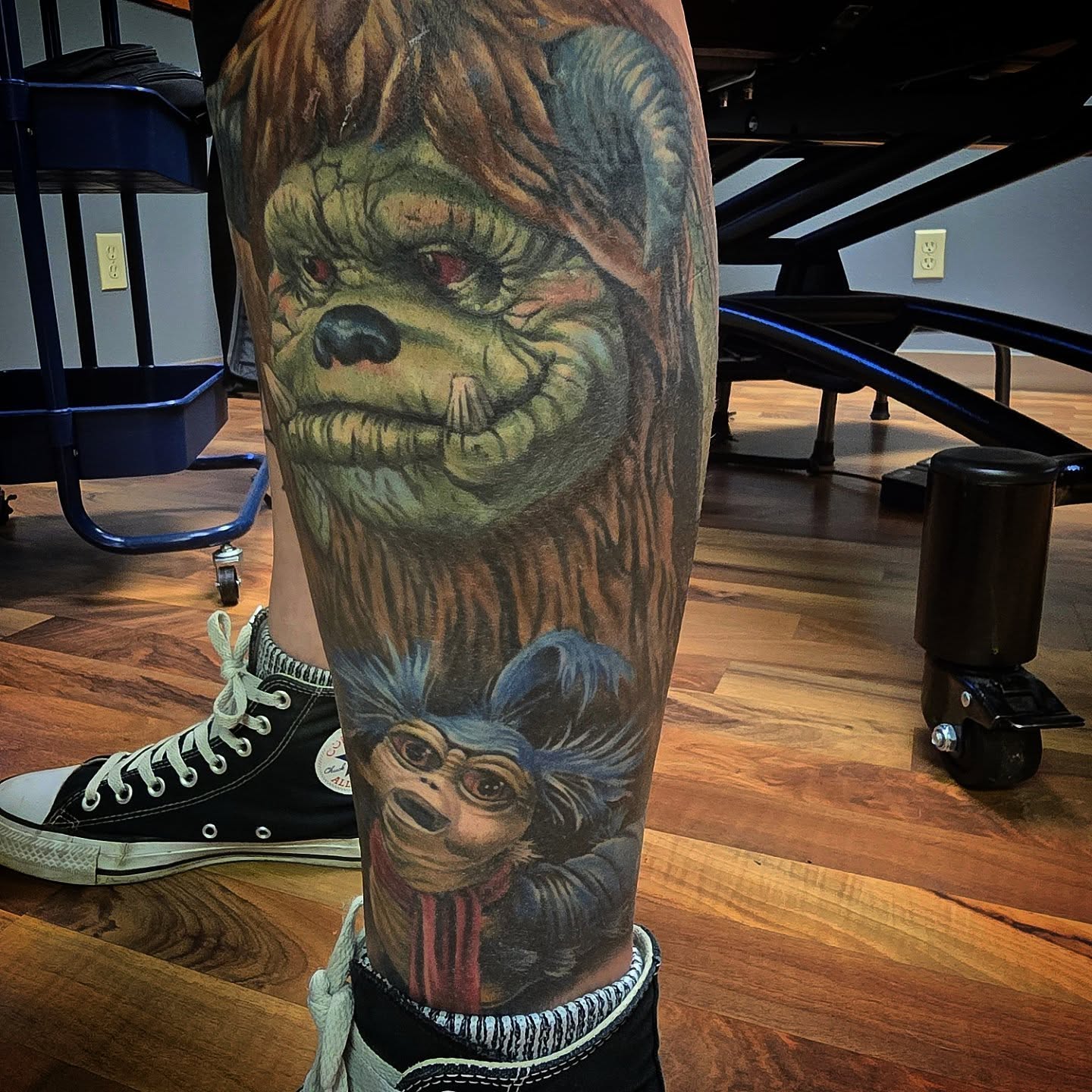 Gremlin and monkey realism tattoo on the calf by Alexander L. Wolff, Rapid City, South Dakota