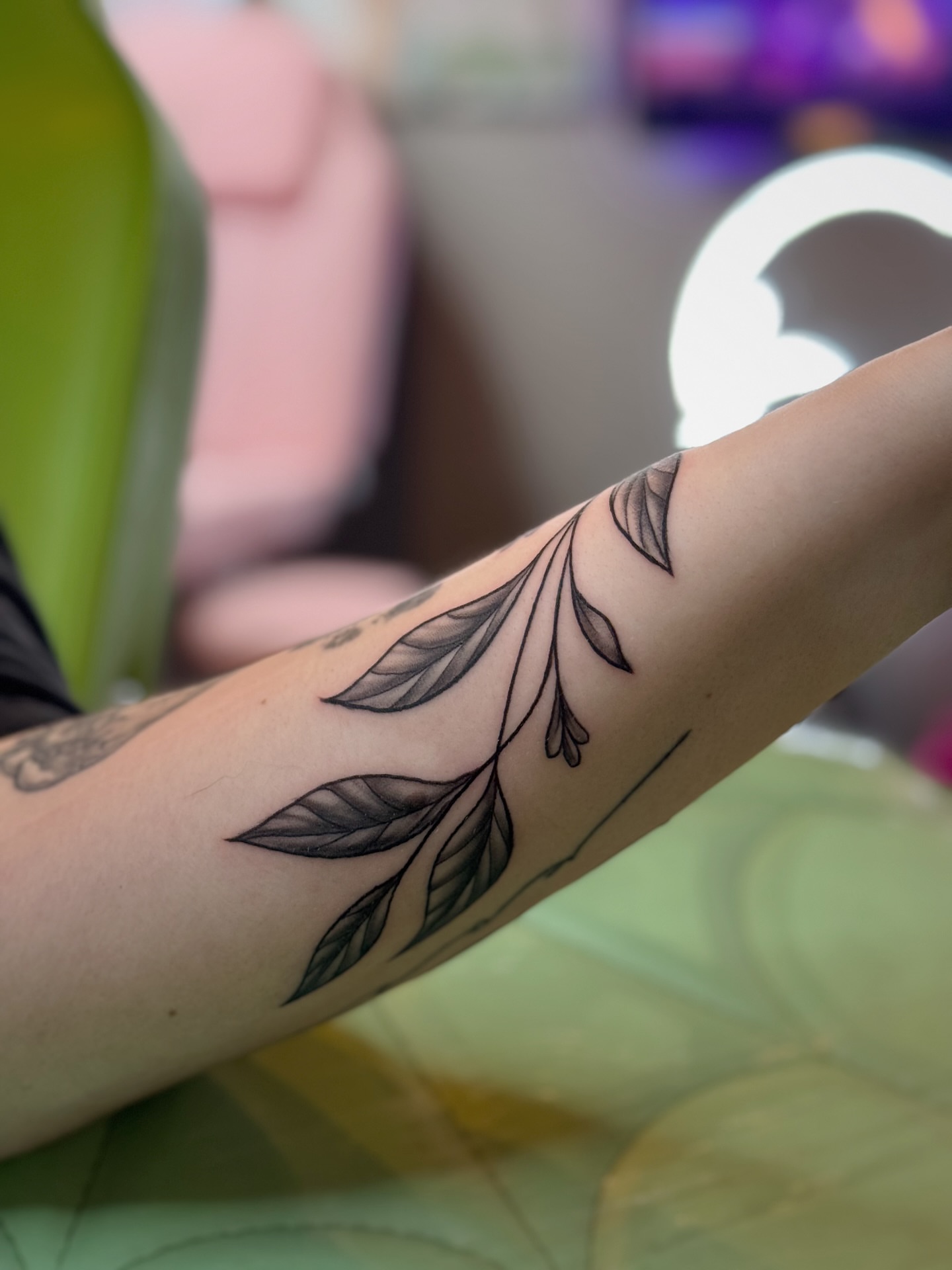 Leaf black and grey tattoo on the forearm by Lily Bejarno