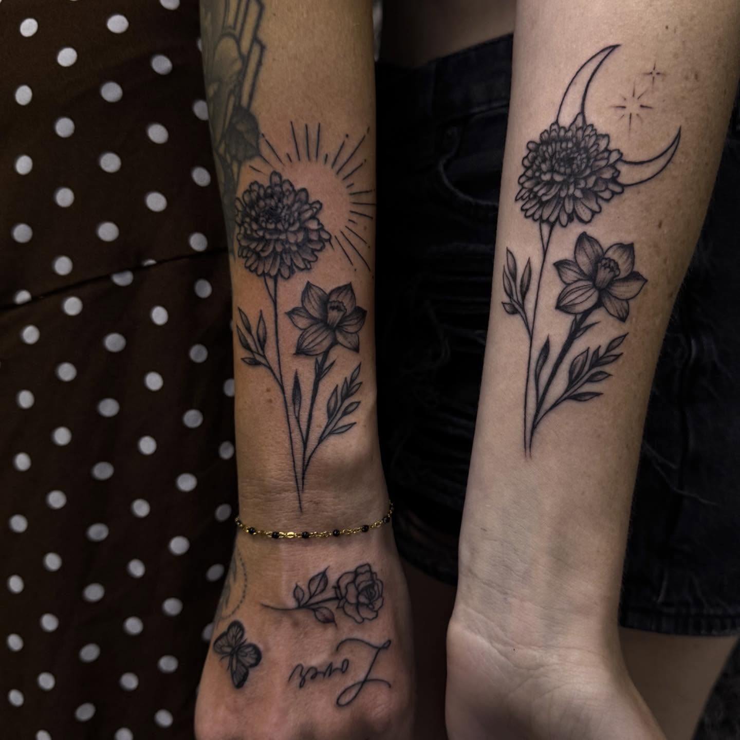 Floral arrangement black and grey tattoo on the forearm by Summer Rain