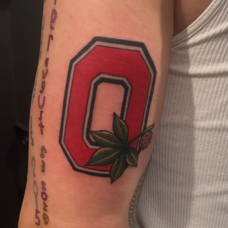 Ohio State Buckeyes logo American traditional tattoo on the forearm by β¨ ππ π₯π ππππ₯π β¨Tattoo Studio