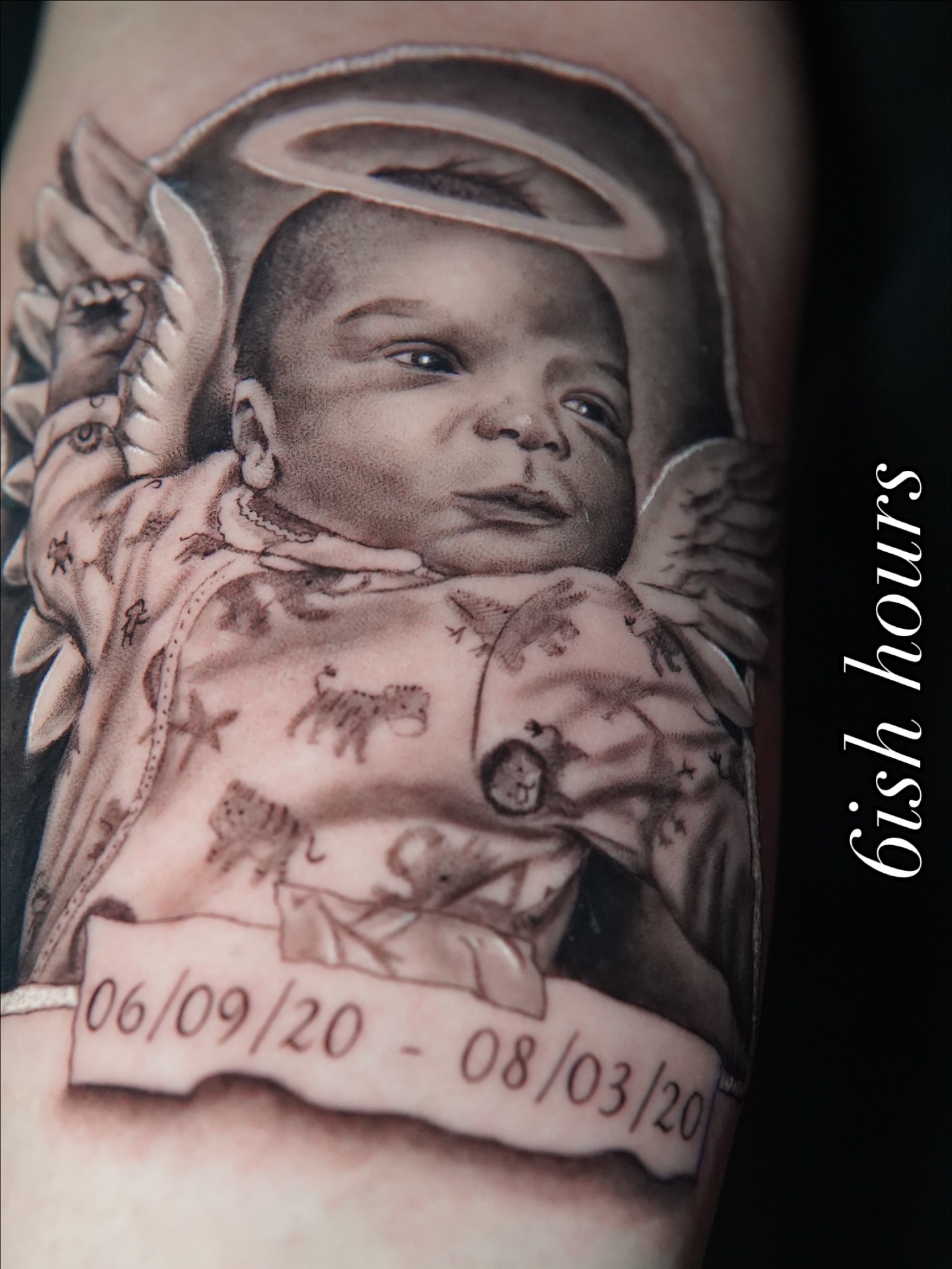 Baby portrait realism tattoo on the forearm by Marissa S., Lansing, Michigan