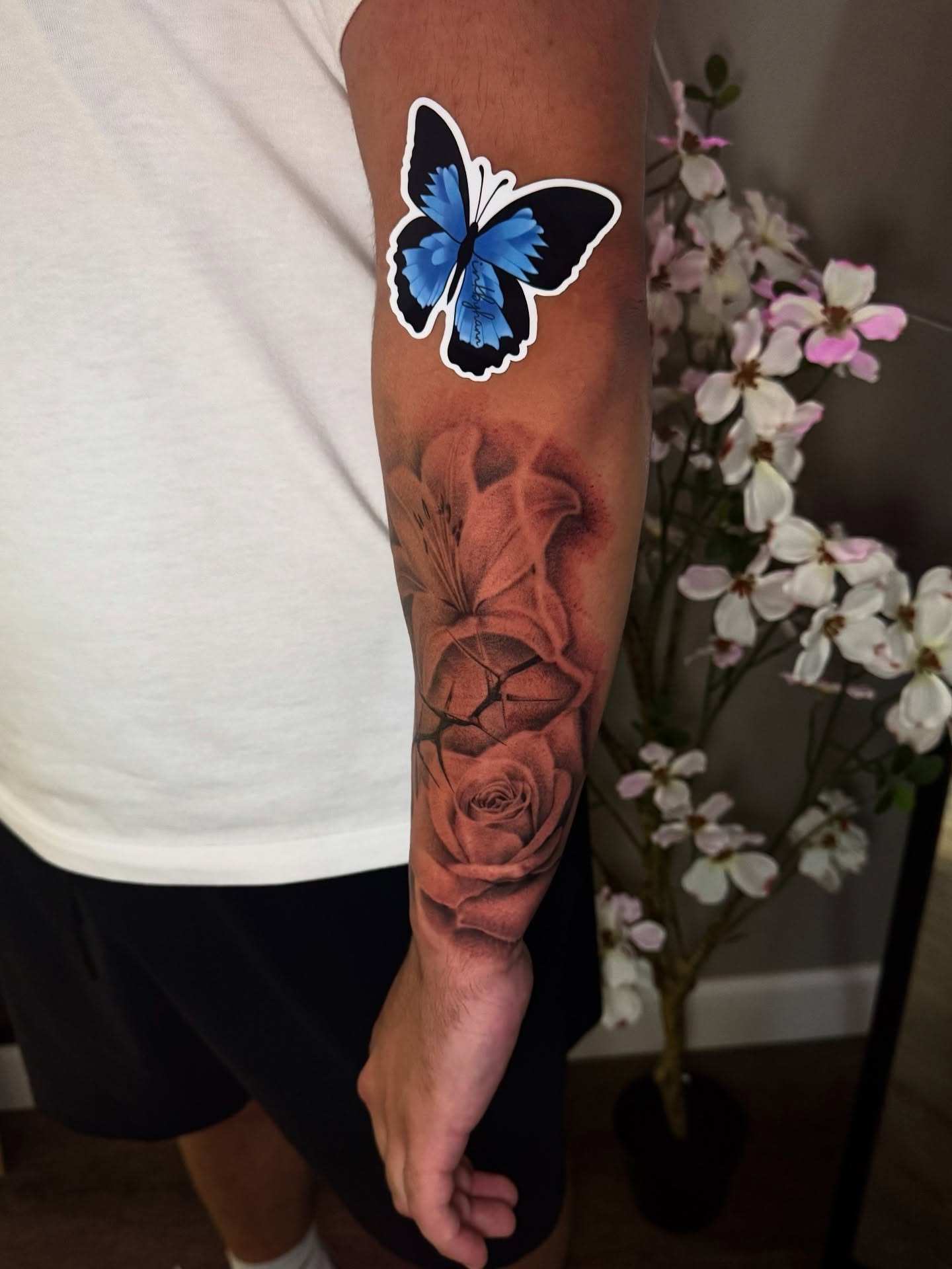 Butterfly and roses realism tattoo on the forearm by Hannah Marie ๐ฆ, Benbrook, Texas