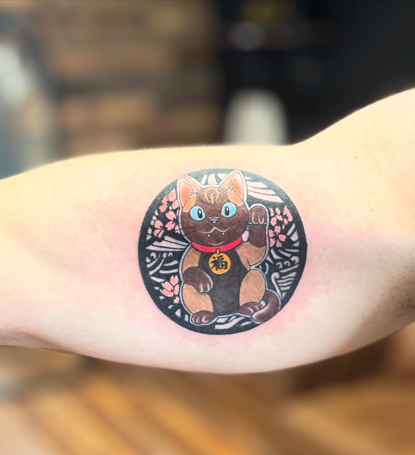 Maneki-neko japanese irezumi tattoo on the forearm by MJ Saunders