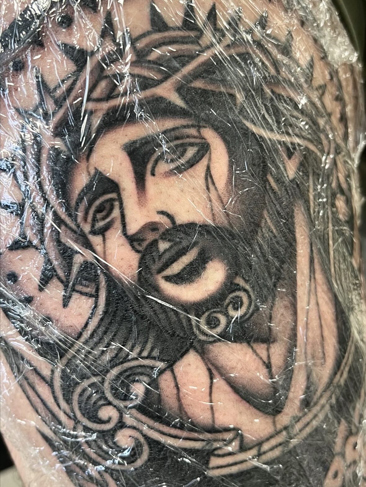 Woman with owl American traditional tattoo on the forearm by Arturo Ledesma
