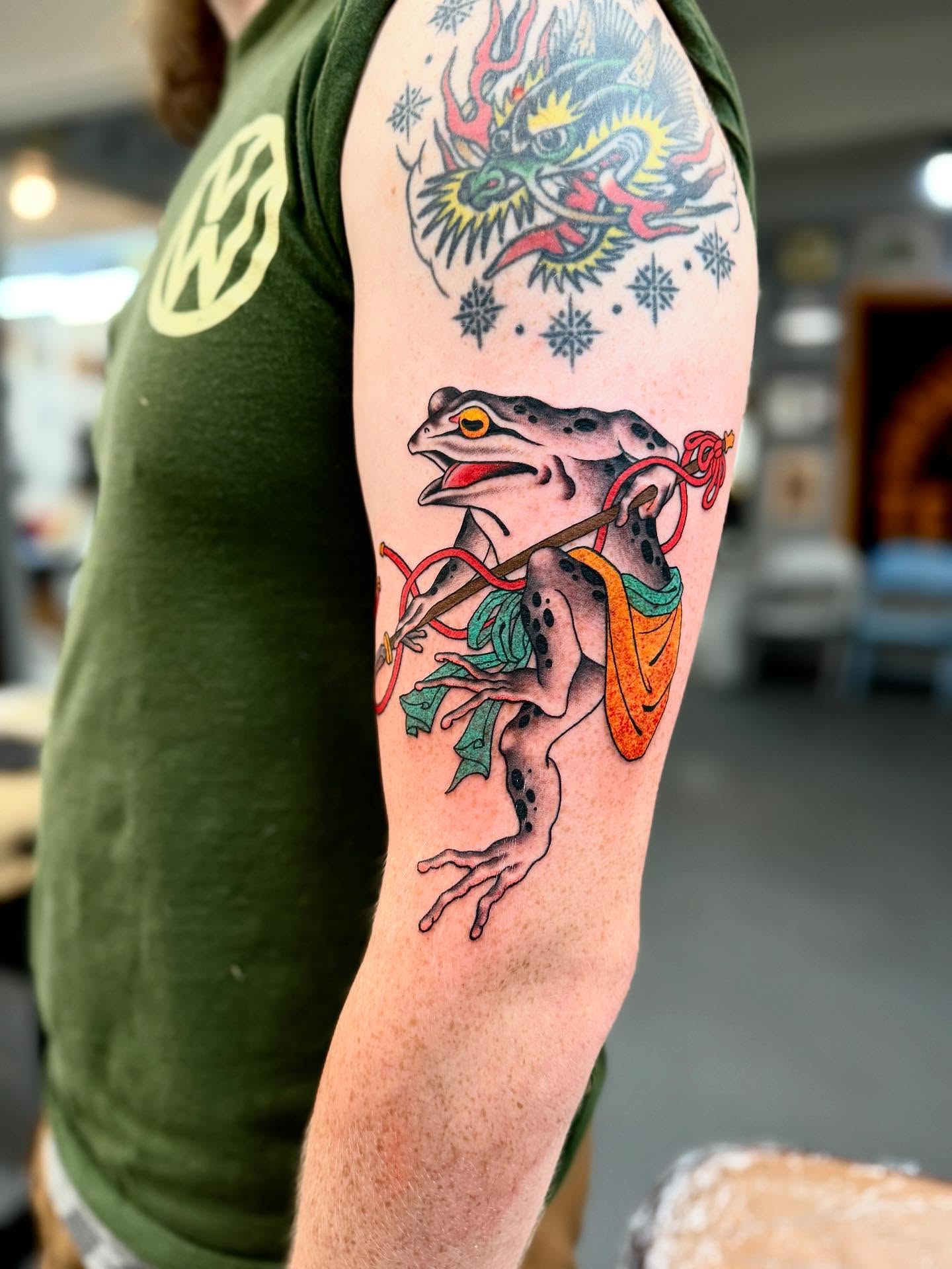 Frog with dragon American traditional tattoo on the forearm by Cole Pittman Memphis Tattoo artist, Memphis, Tennessee