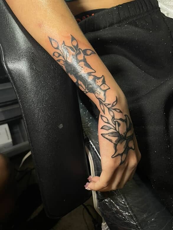 Floral black and grey tattoo on the forearm by Dm To Book ๐, Charlotte, North Carolina