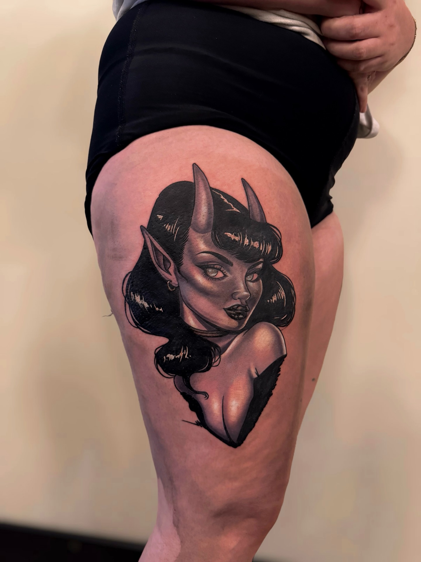 Demon woman American traditional tattoo on the thigh by Suda