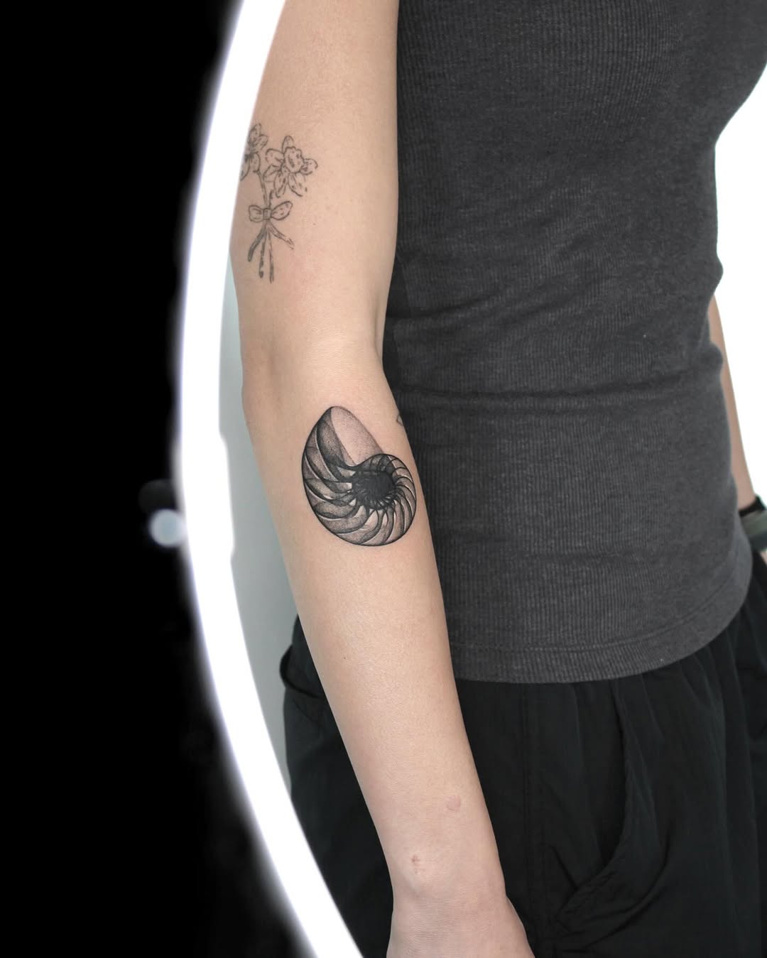Tattoo by @tatmostat — black_and_grey, realism