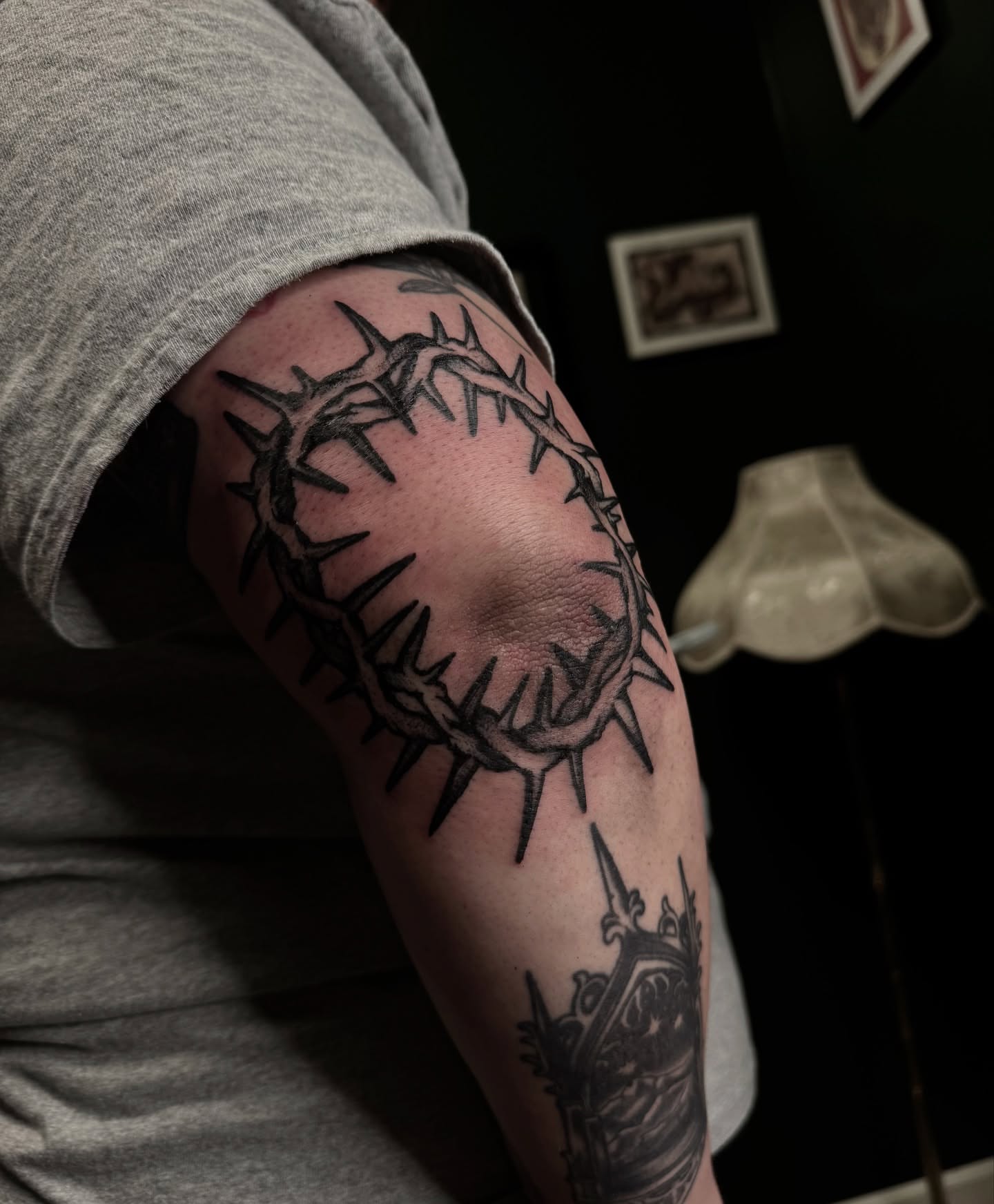 Crown of thorns black and grey tattoo on the forearm by Saffron Florea, Tiffin, Ohio