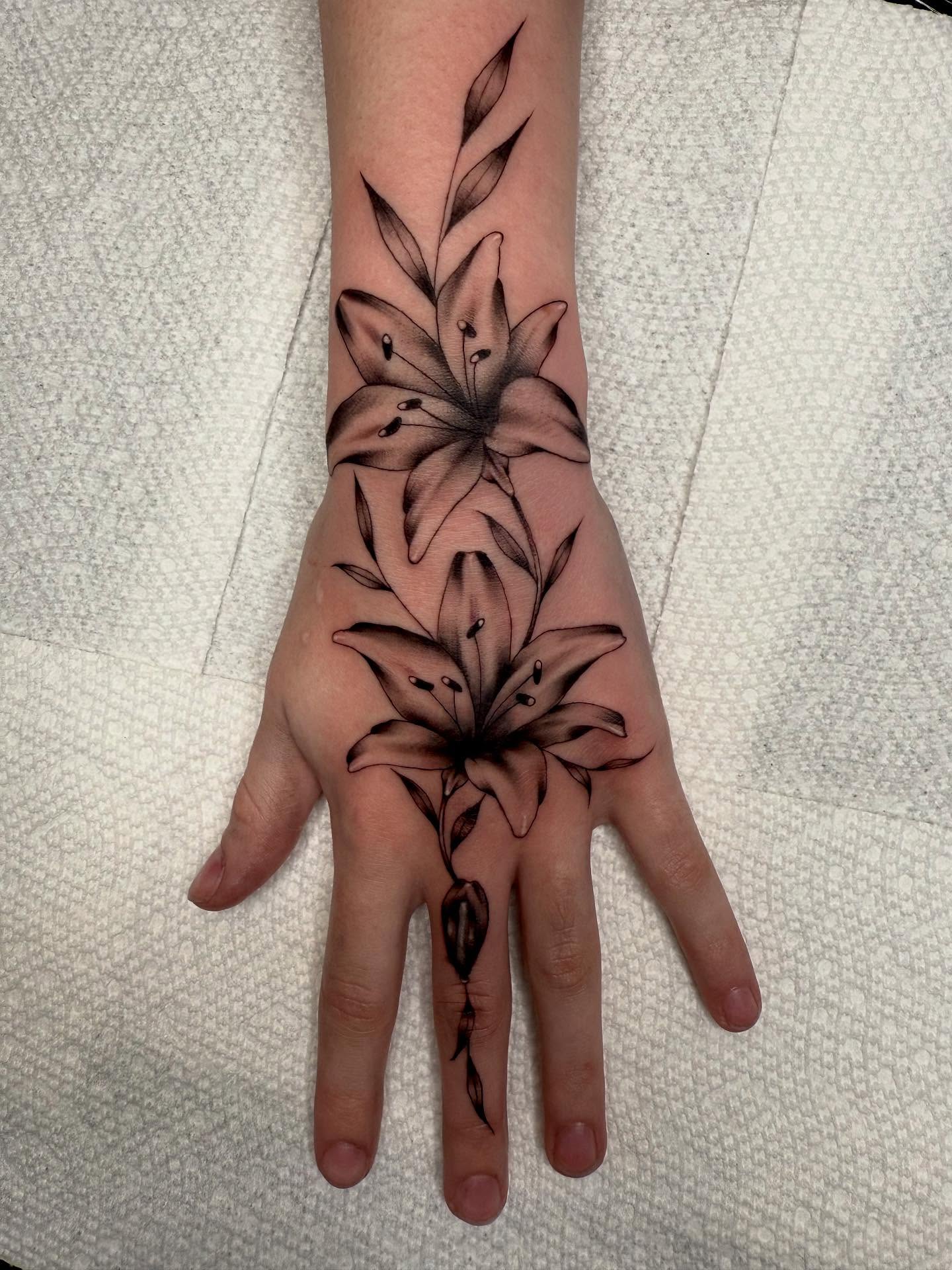 Lily black and grey tattoo on the hand by KZ