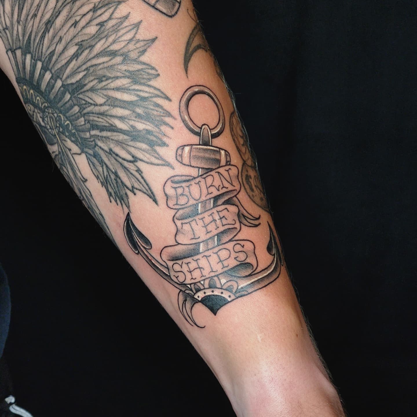 Anchor with banner American traditional tattoo on the forearm by Audrey Luther