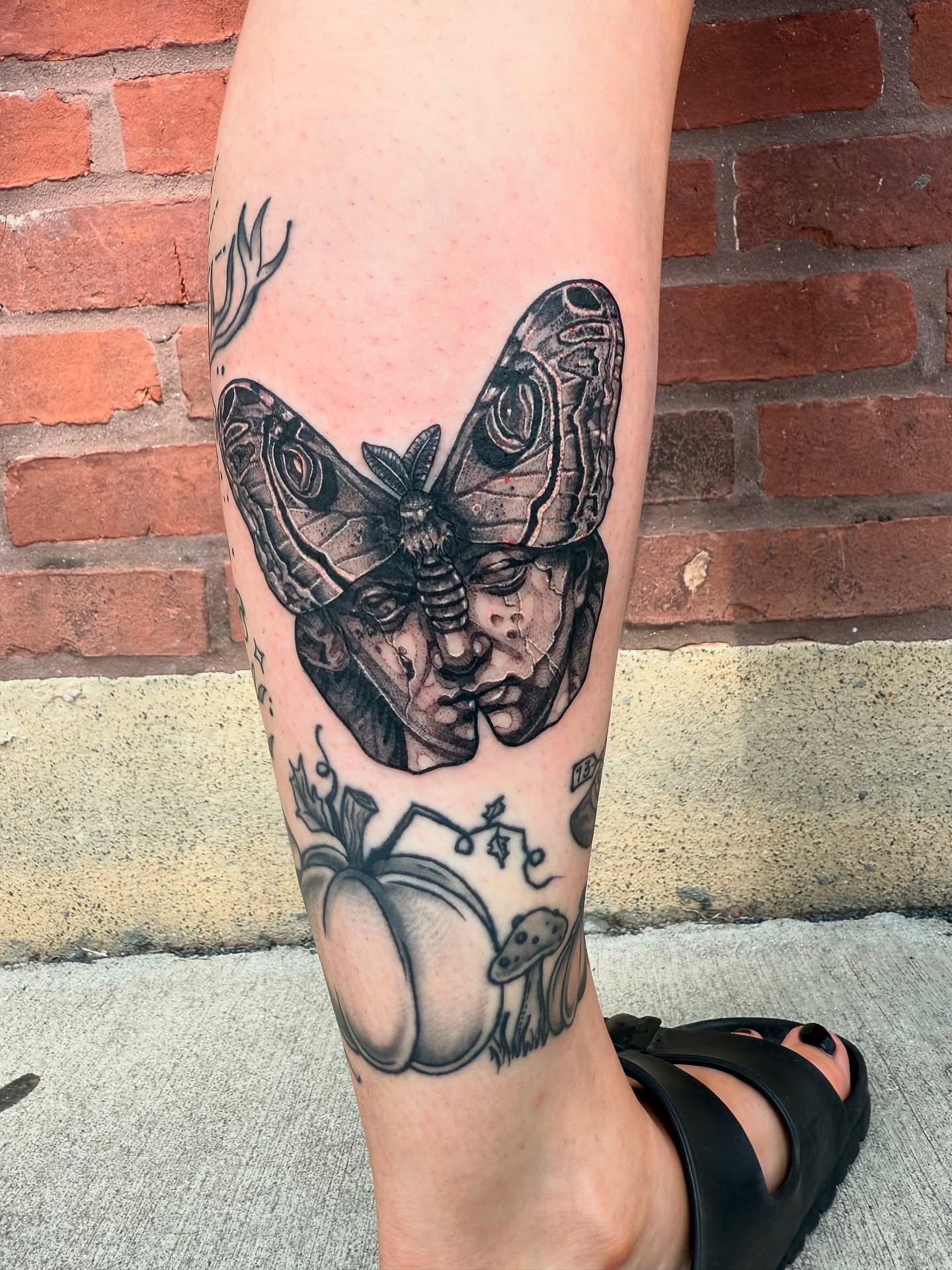 Butterfly realism tattoo on the calf by Danielle