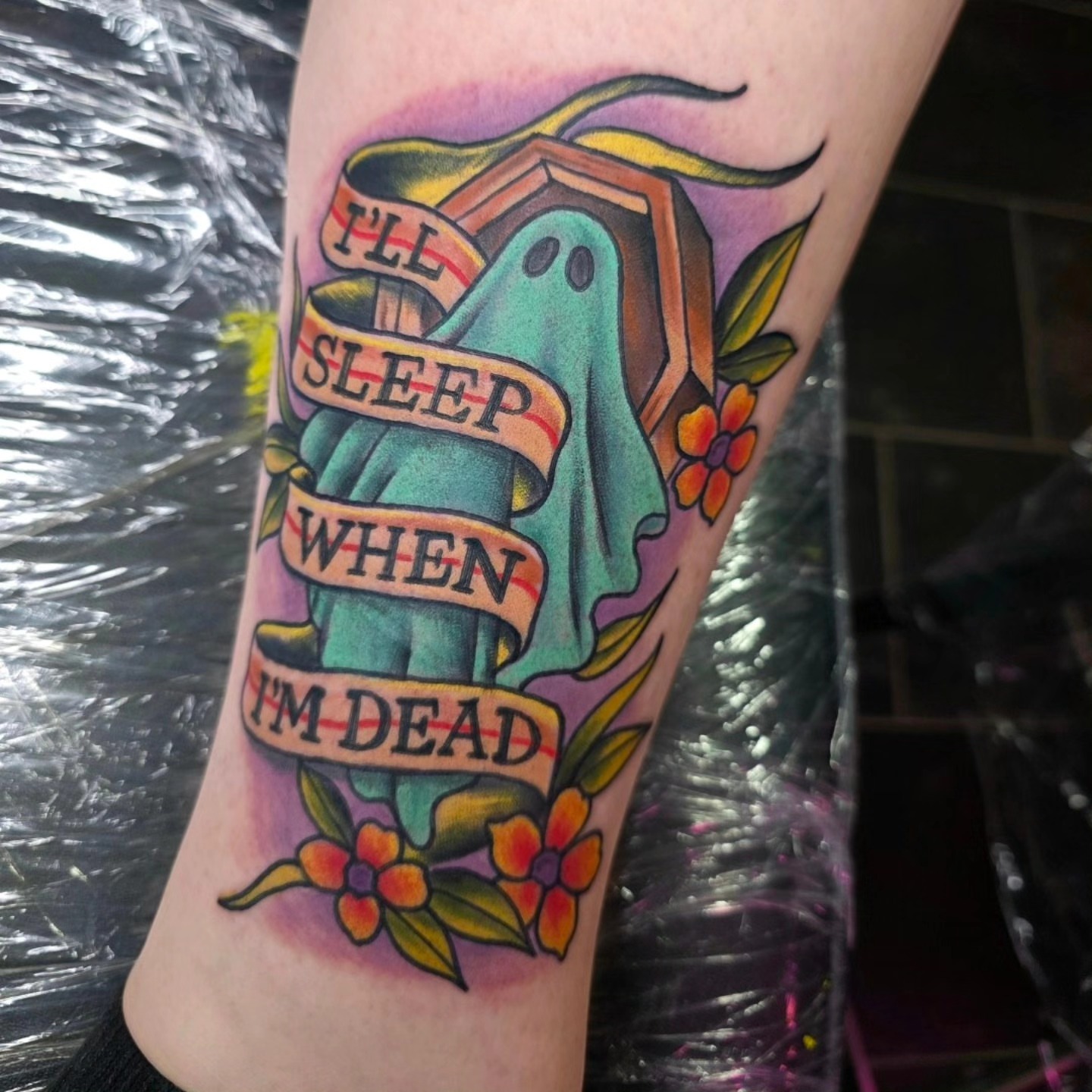 Ghost with banner American traditional tattoo on the forearm by Michael Latendresse