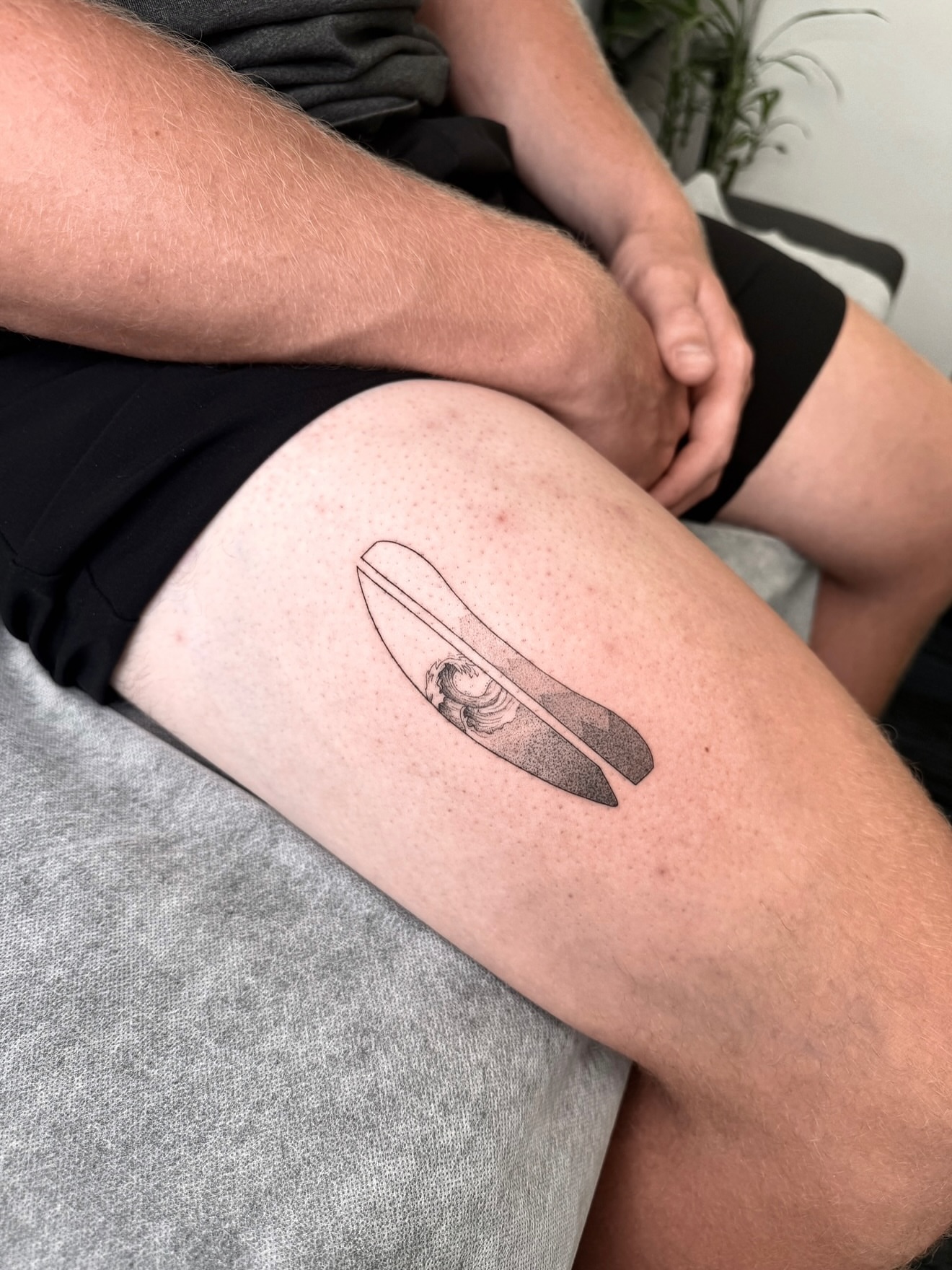 Woman black and grey tattoo on the thigh by Your tattoo Artist, New York, New York