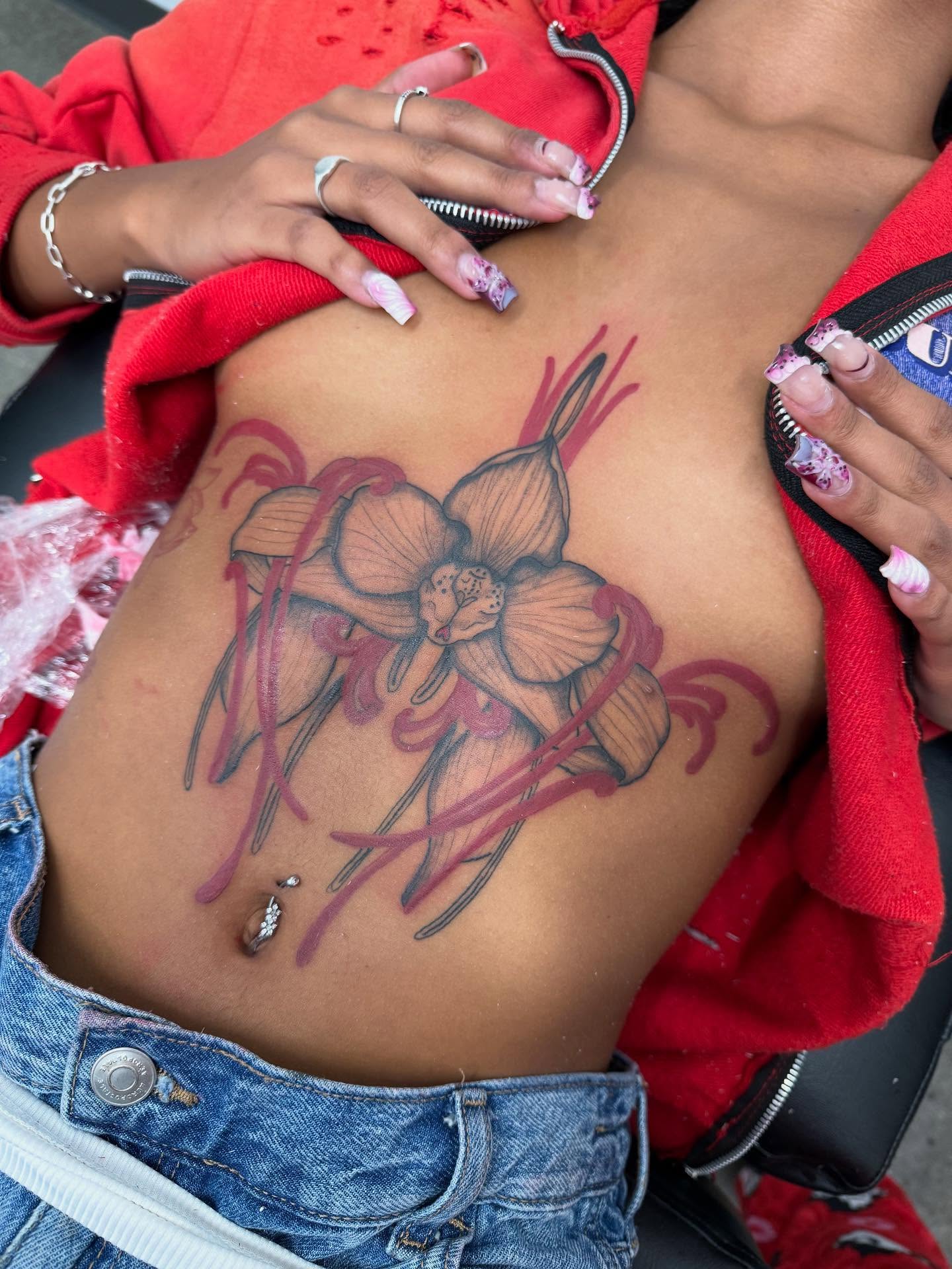 Orchid black and grey tattoo on the ribs by Stephania ATLANTA TATTOO ARTIST🎨