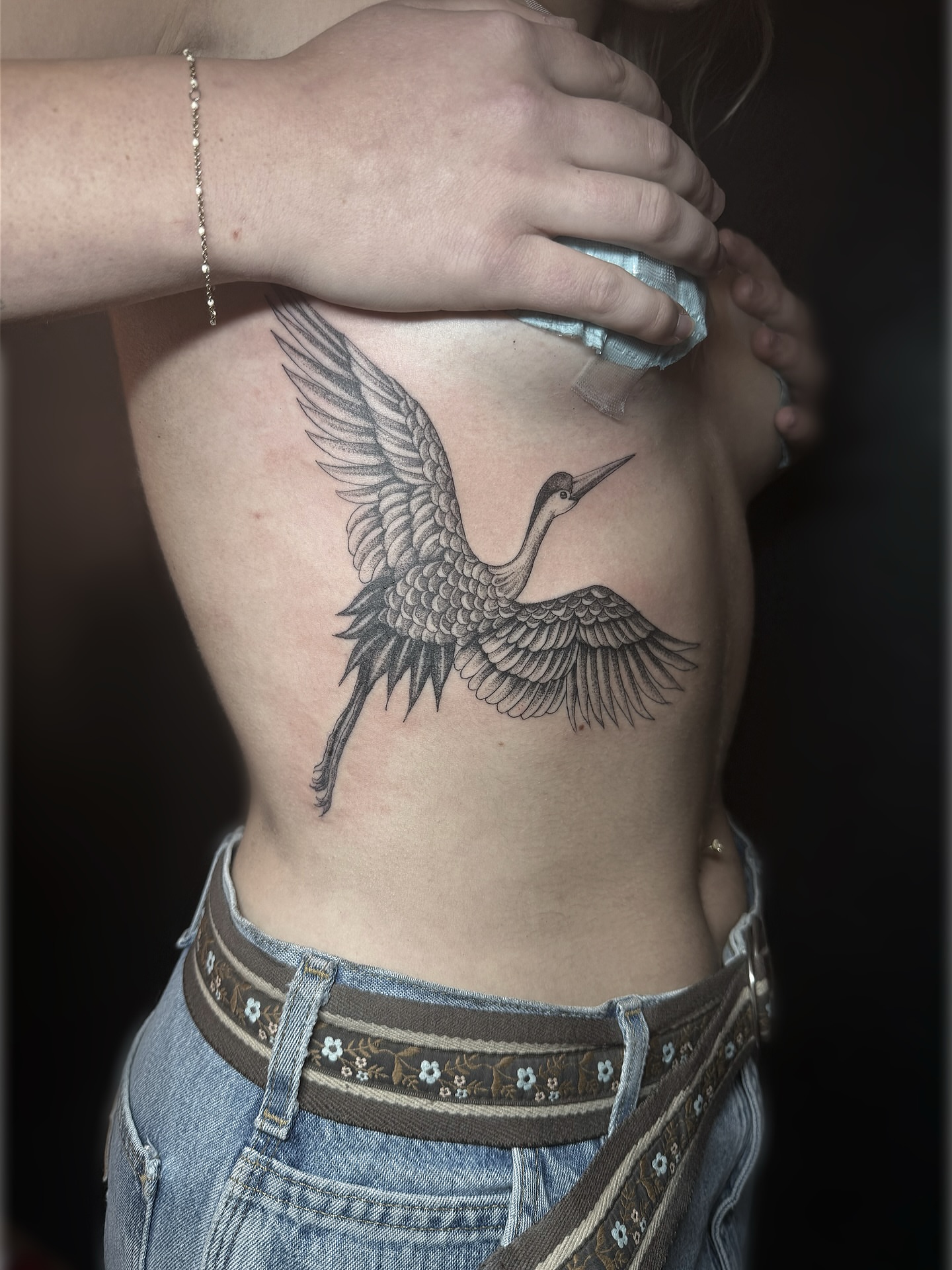 Bird black and grey tattoo on the ribs by Rafael Alfredo Armas Hoyos, Salt Lake City, Utah