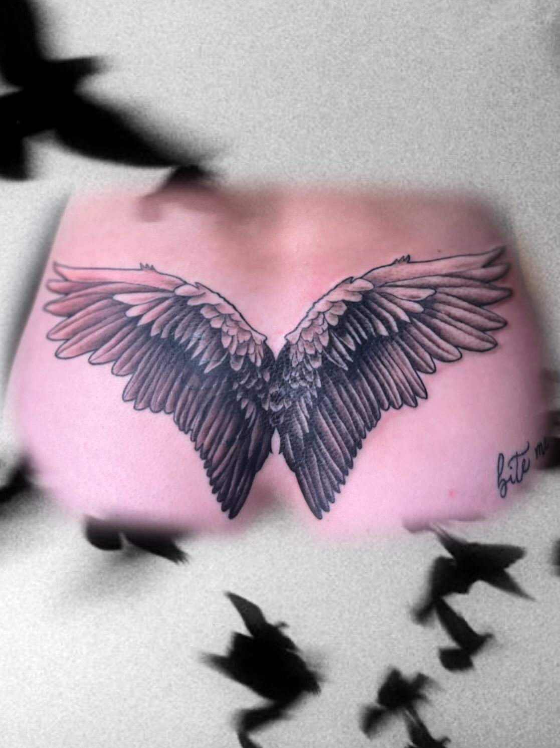 Wings black and grey tattoo on the thigh by Lexi Ross