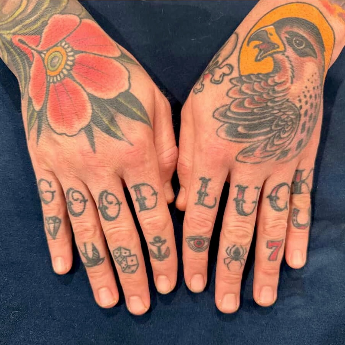 Good luck American traditional tattoo on the hand by Ｊｉｍ Ｓｙｌｖｉａ