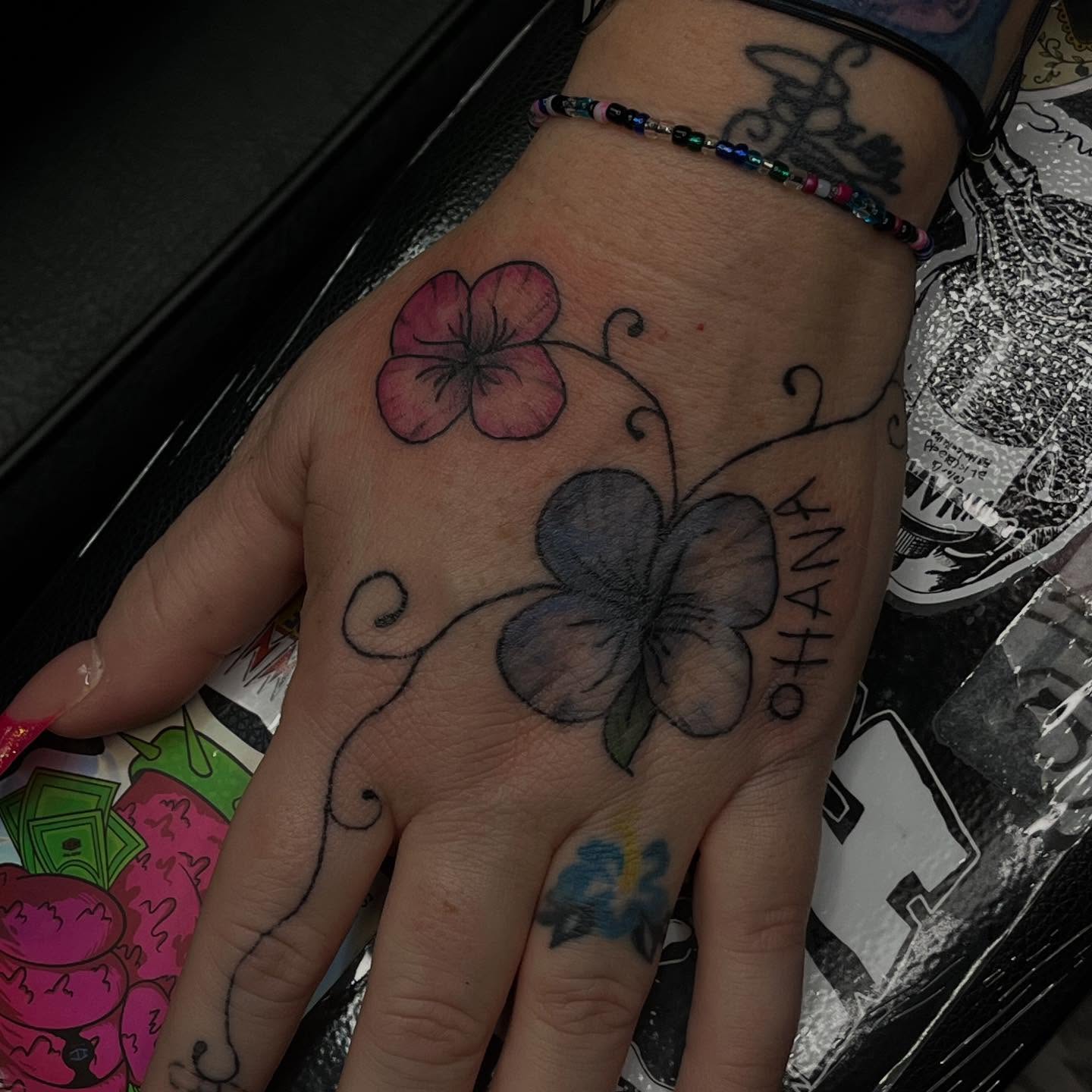 Flowers dotwork tattoo on the hand by destiny🌞