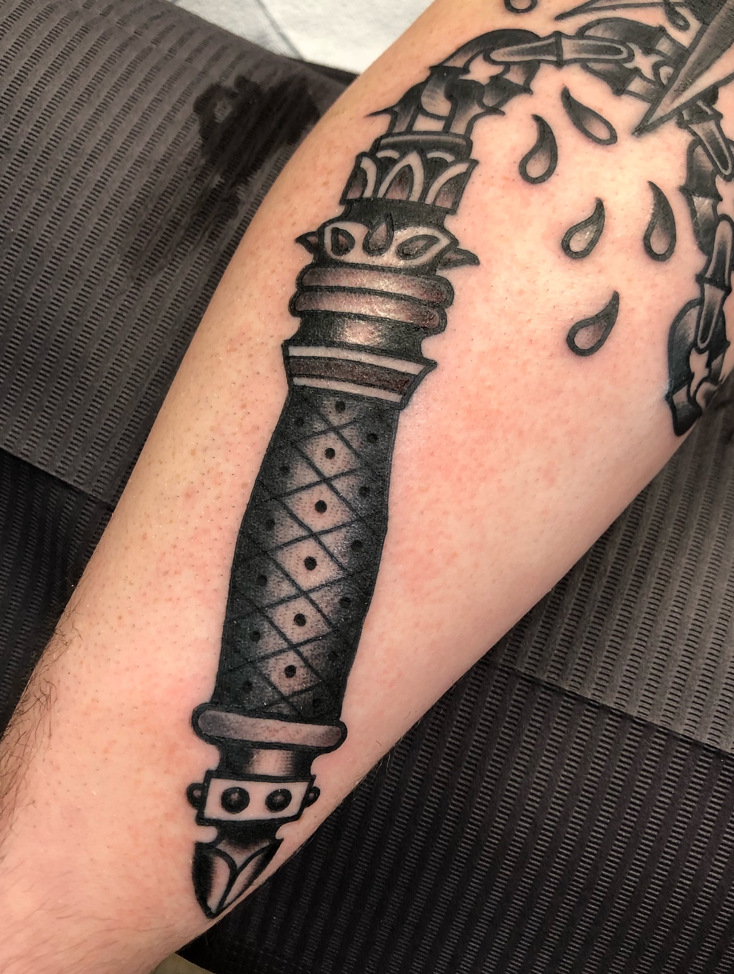 Torch dotwork tattoo on the forearm by Nick Sharratt, Chicago, Illinois