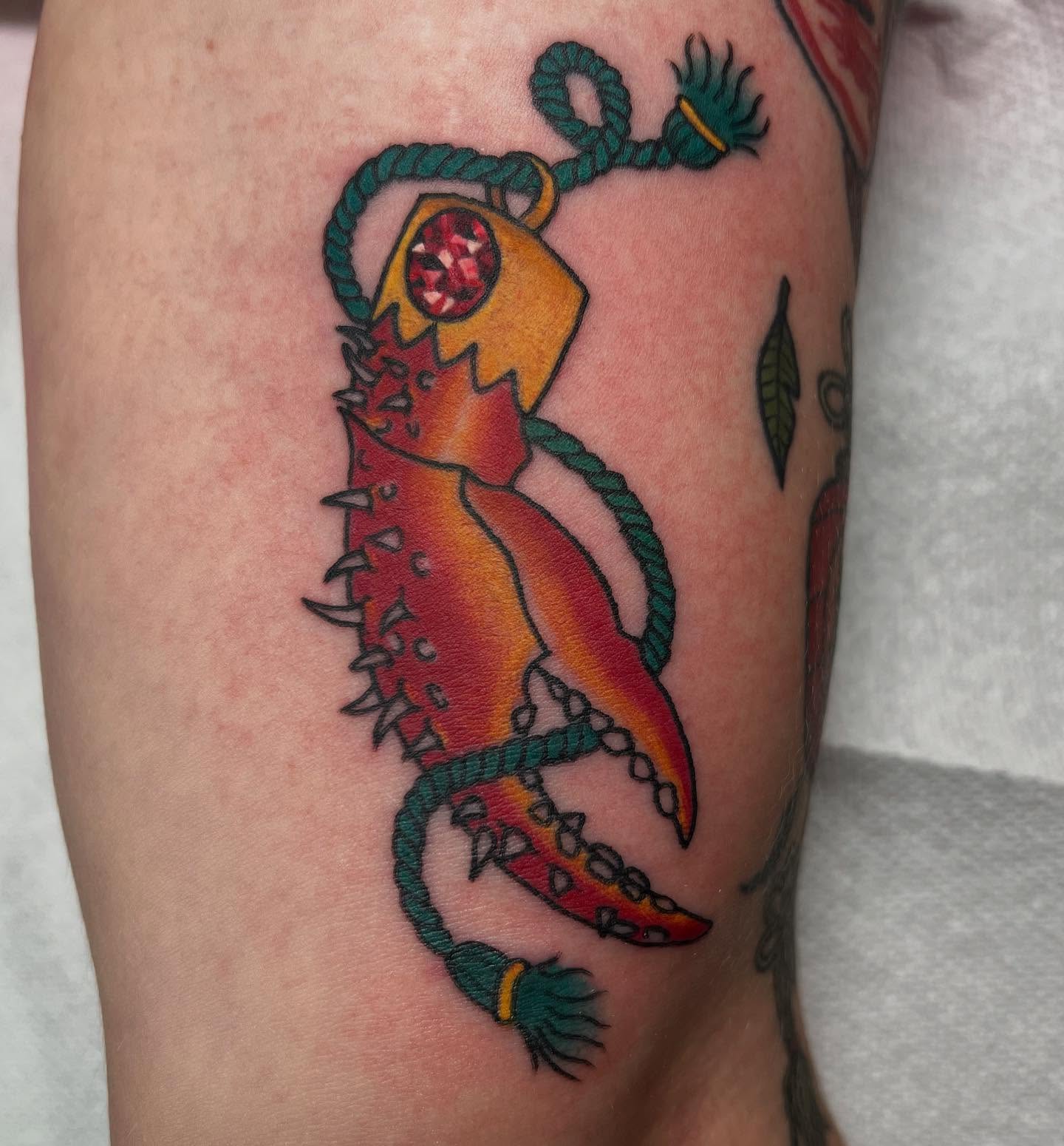 Lizard American traditional tattoo on the forearm by Juliet Miller