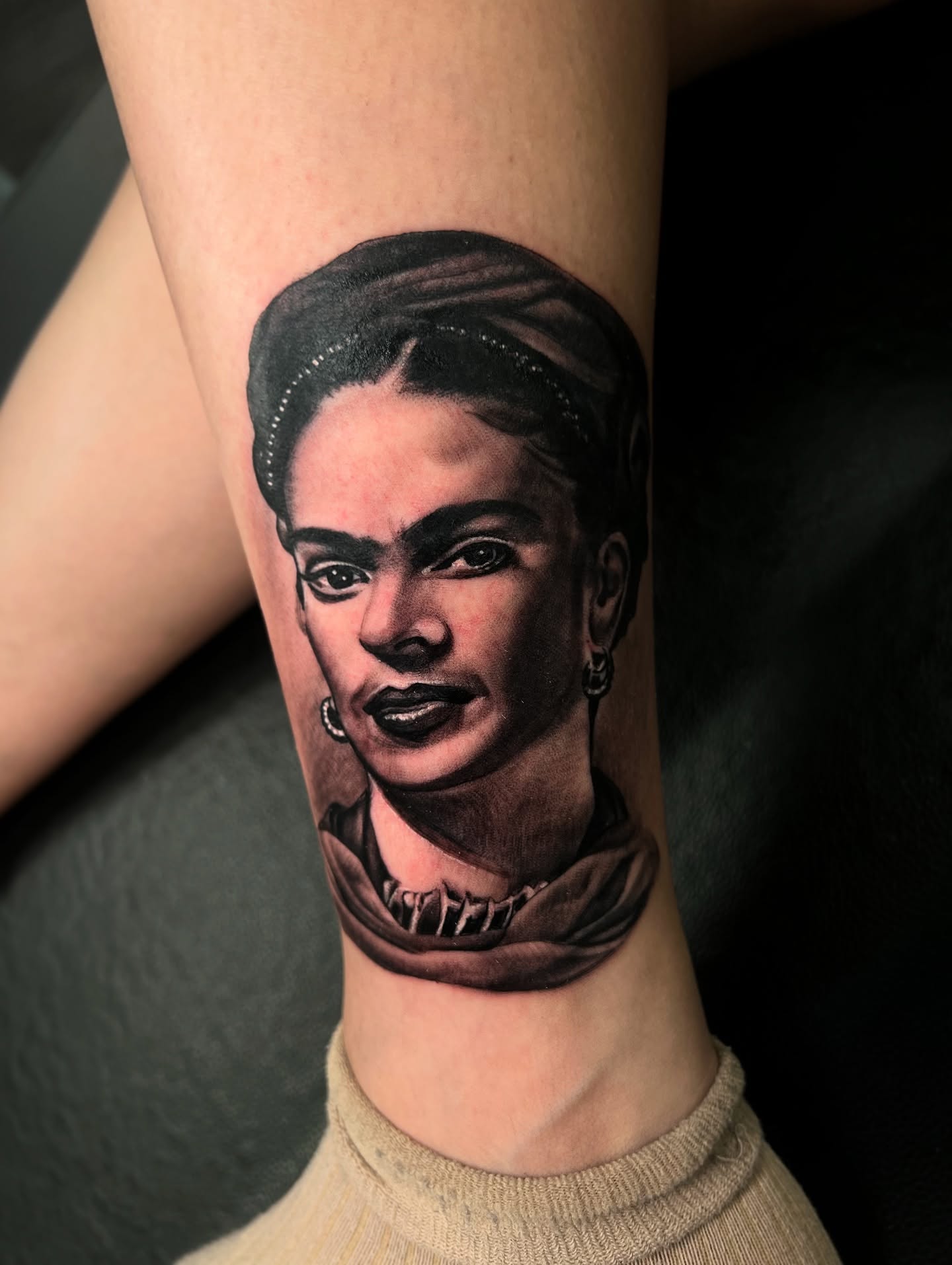 Portrait realism tattoo on the forearm by Vondrae