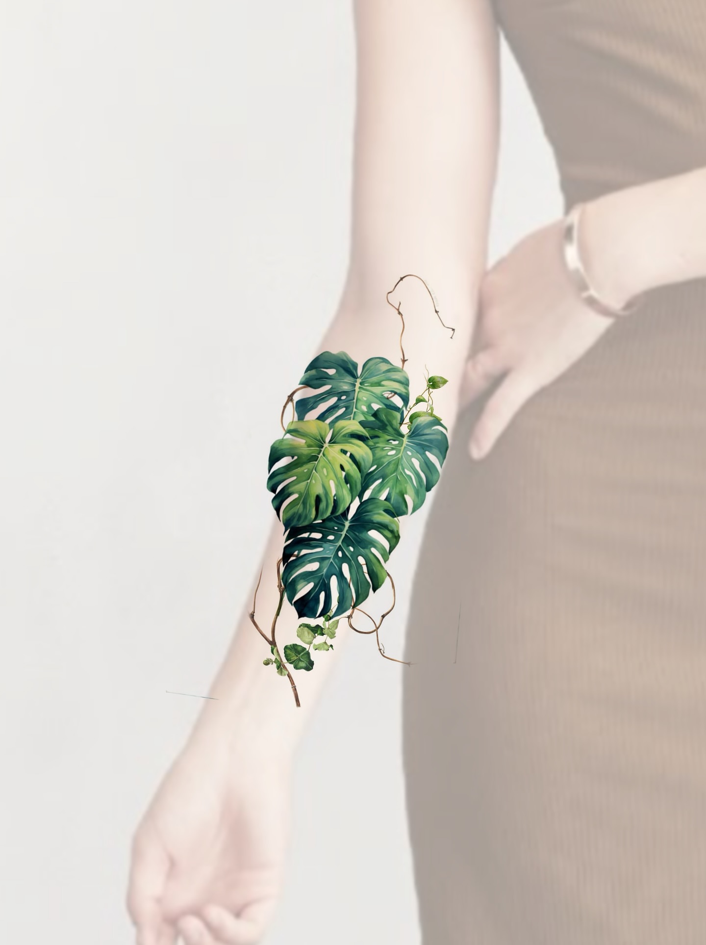 Monstera plant realism tattoo on the forearm by Henry