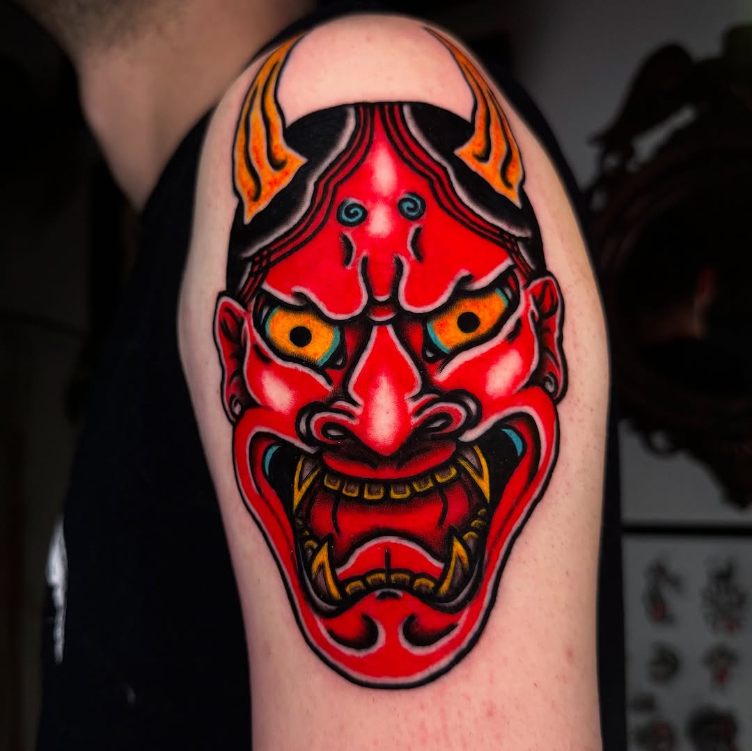 Oni mask Japanese tattoo on the shoulder by Mika