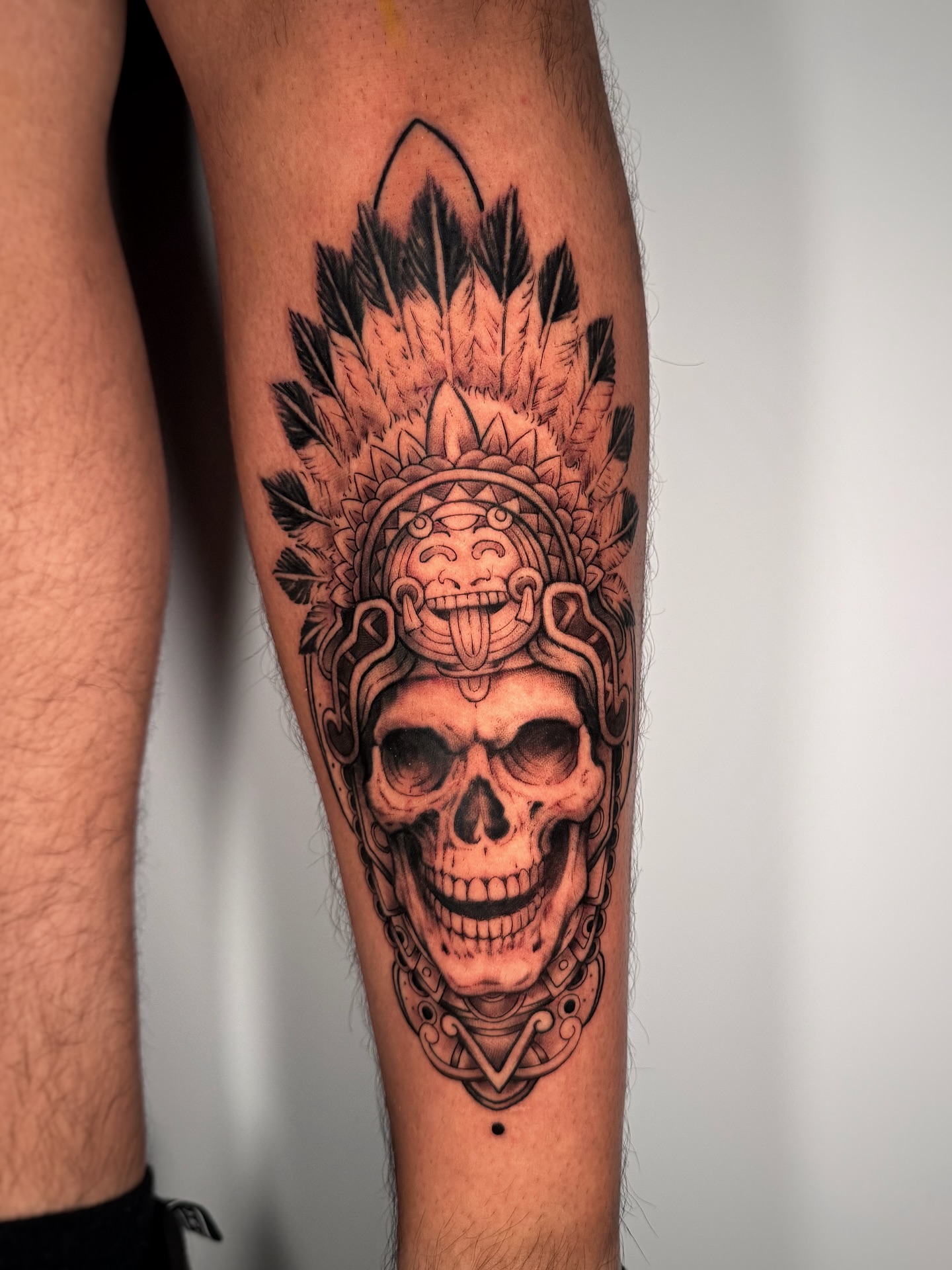 Skull with headdress realism tattoo on the forearm by Moi Rivas, Salt Lake City, Utah