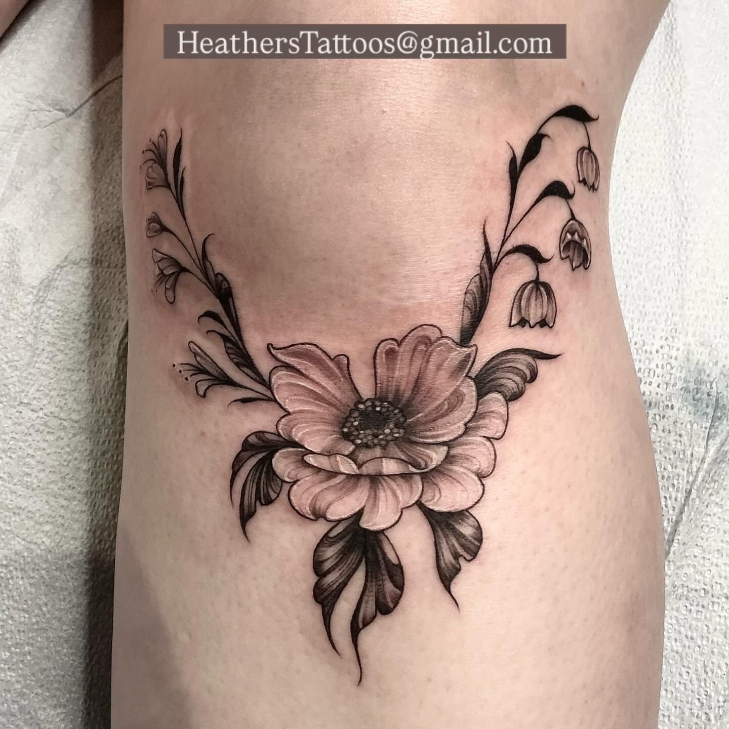 Flower black and grey tattoo on the thigh by Heather Syvilla Tattoos
