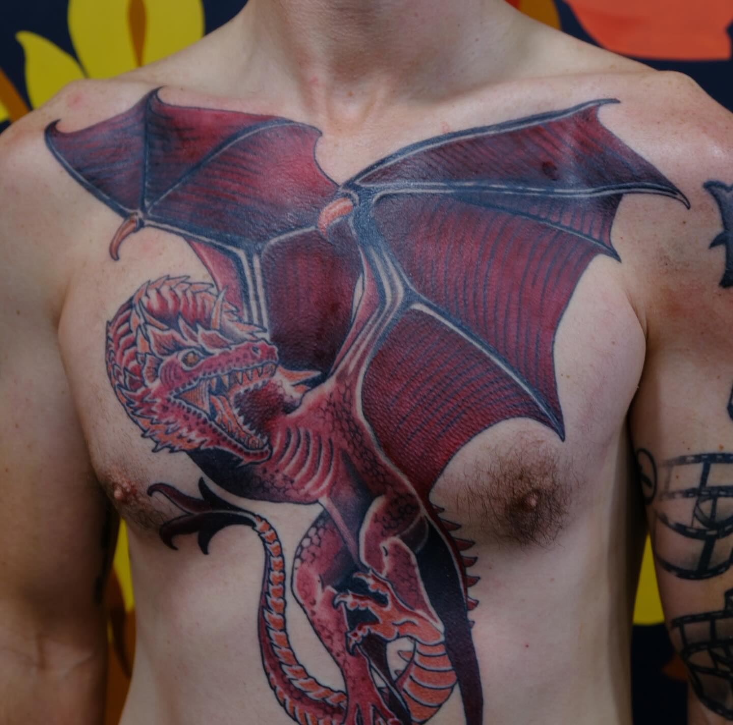 Dragon realism tattoo on the chest by English Cousins, Nashville, Tennessee