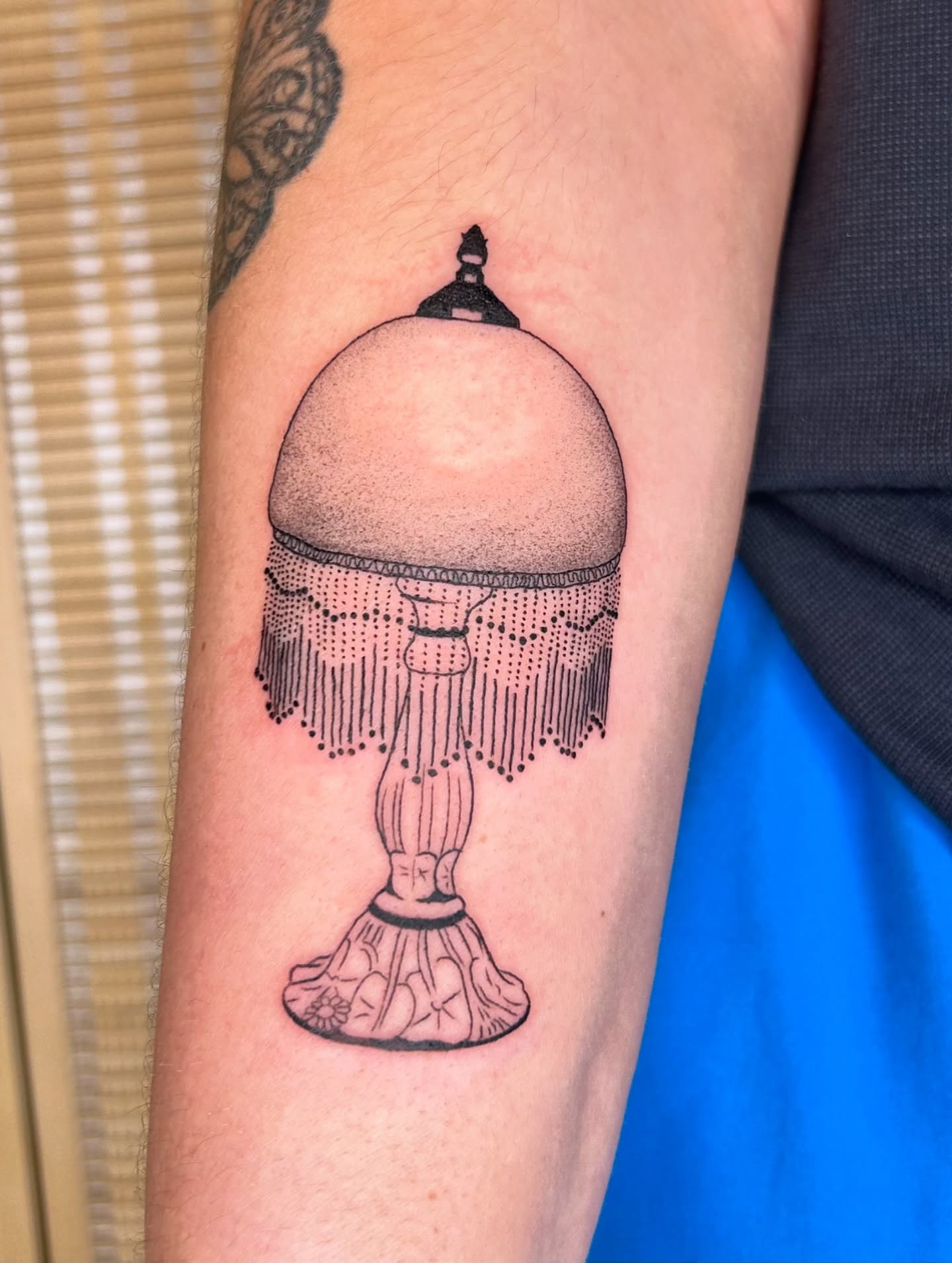 Lampshade dotwork tattoo on the forearm by beth
