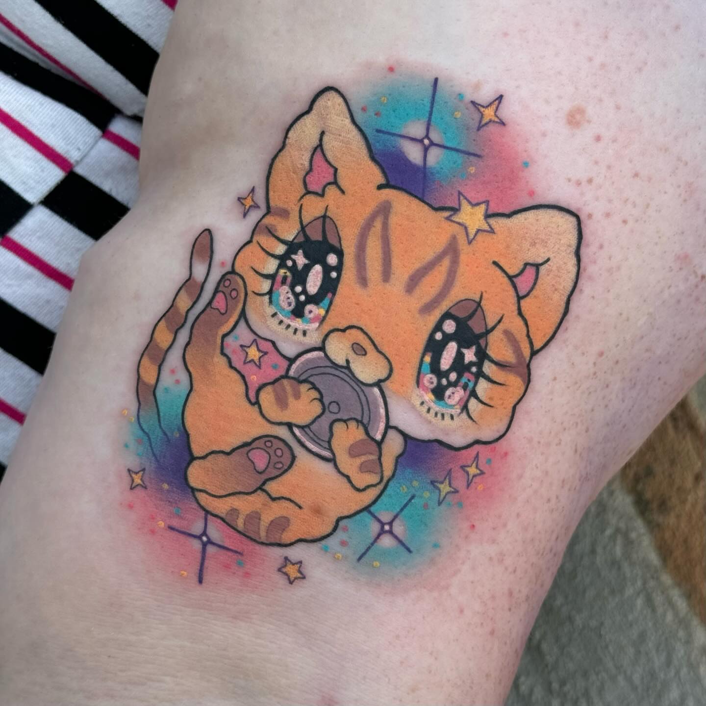 Kitty with record player new school tattoo on the forearm by Taylor Nicoll Chunn